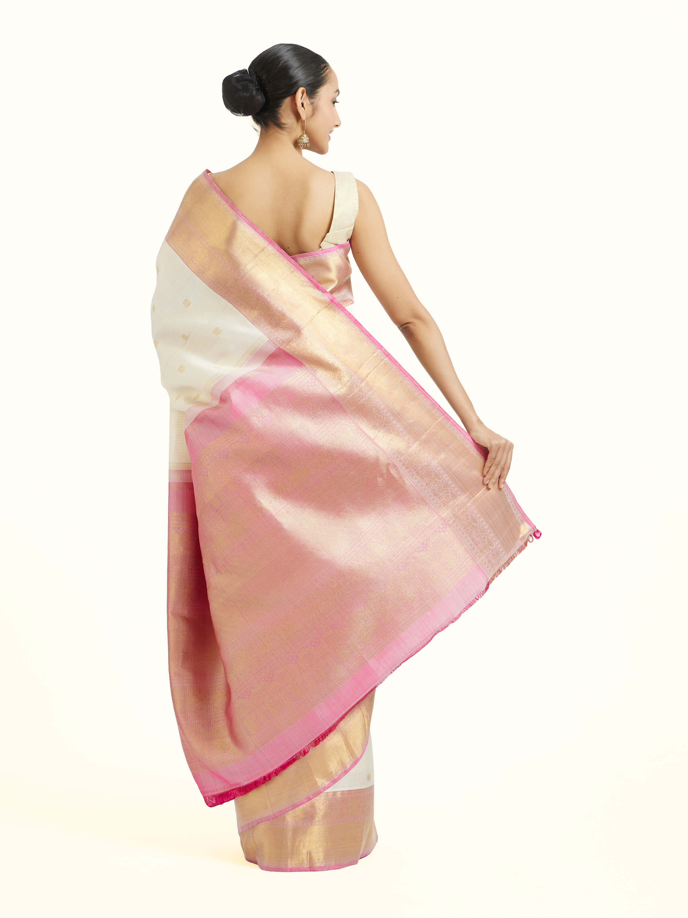 Back view of off-white silk Kancheepuram saree with ornate pallu design
