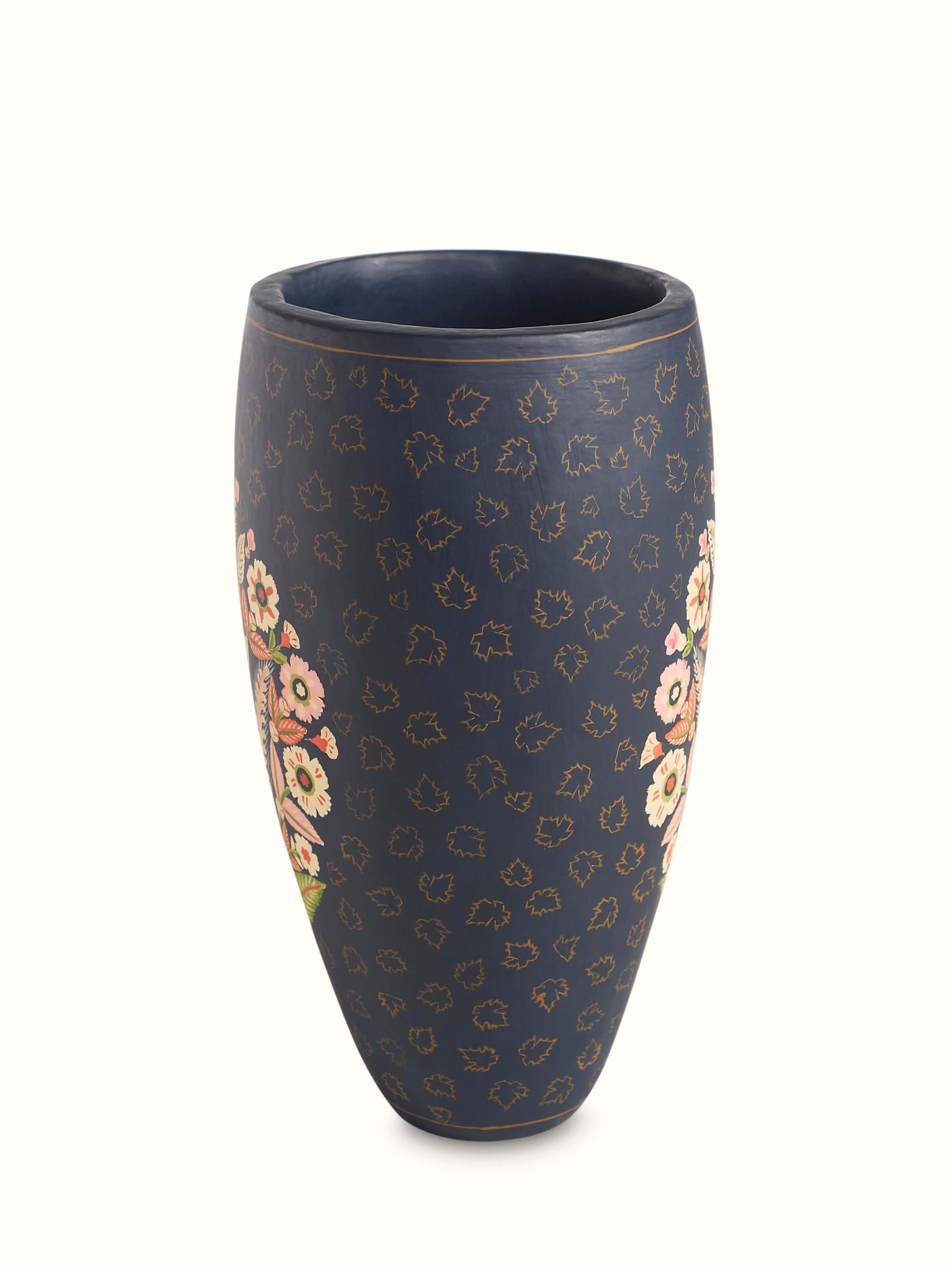 Artistic close-up of Papier-mache chinar table vase