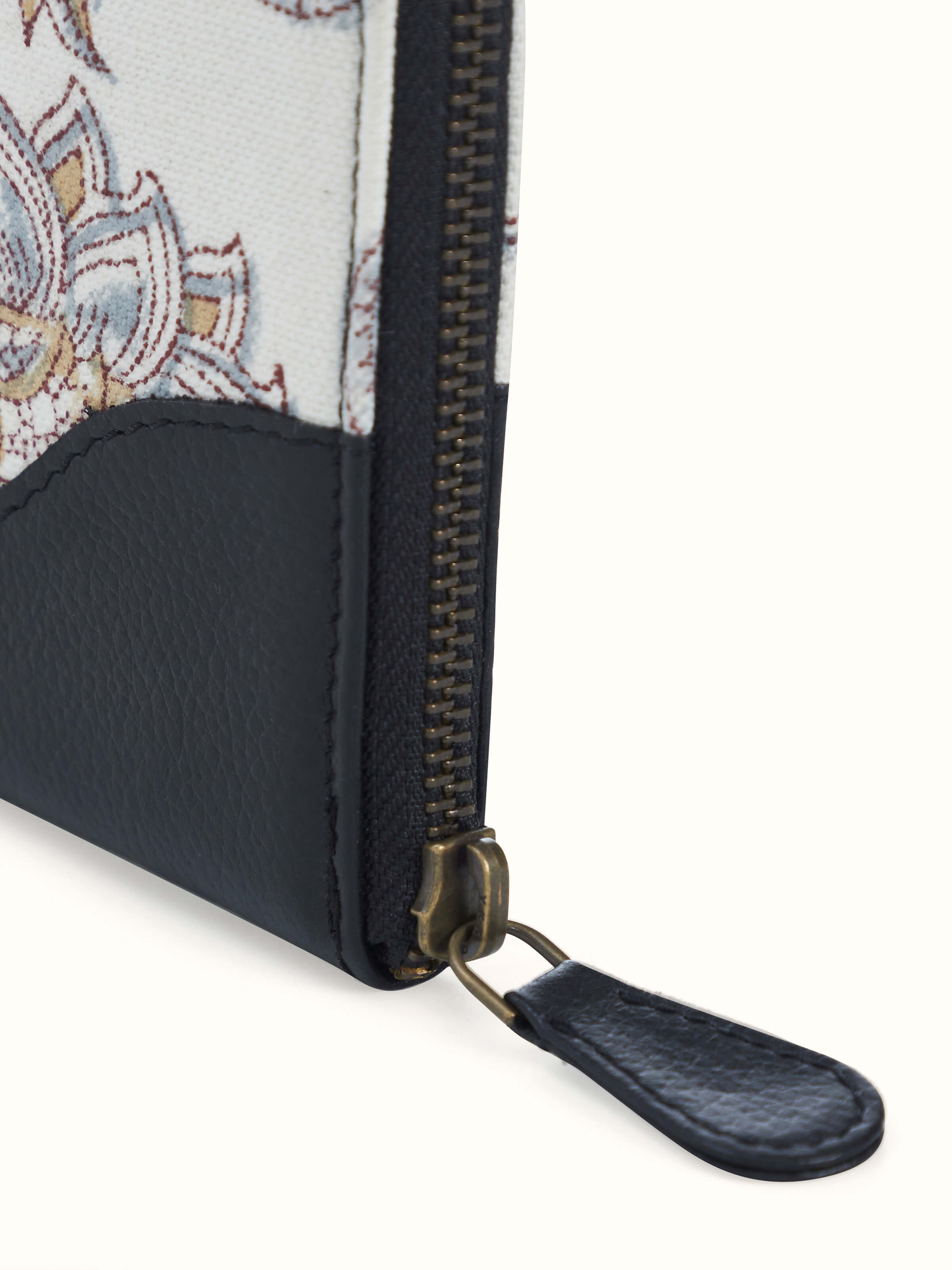 Open view of wallet showcasing inner compartments for cards and essentials.