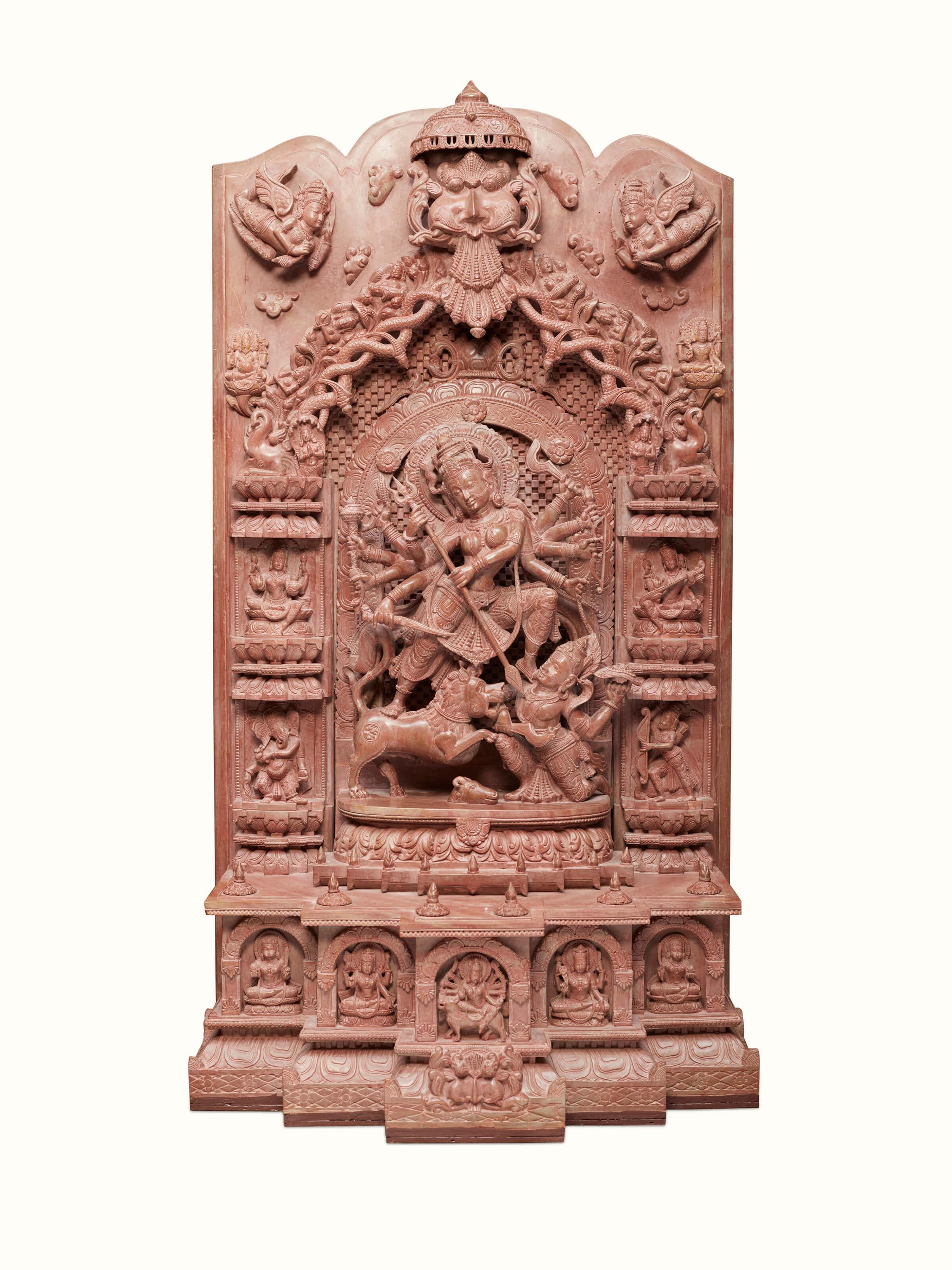 Front view of Stone Devi Idol showcasing its carved details and devotional significance.