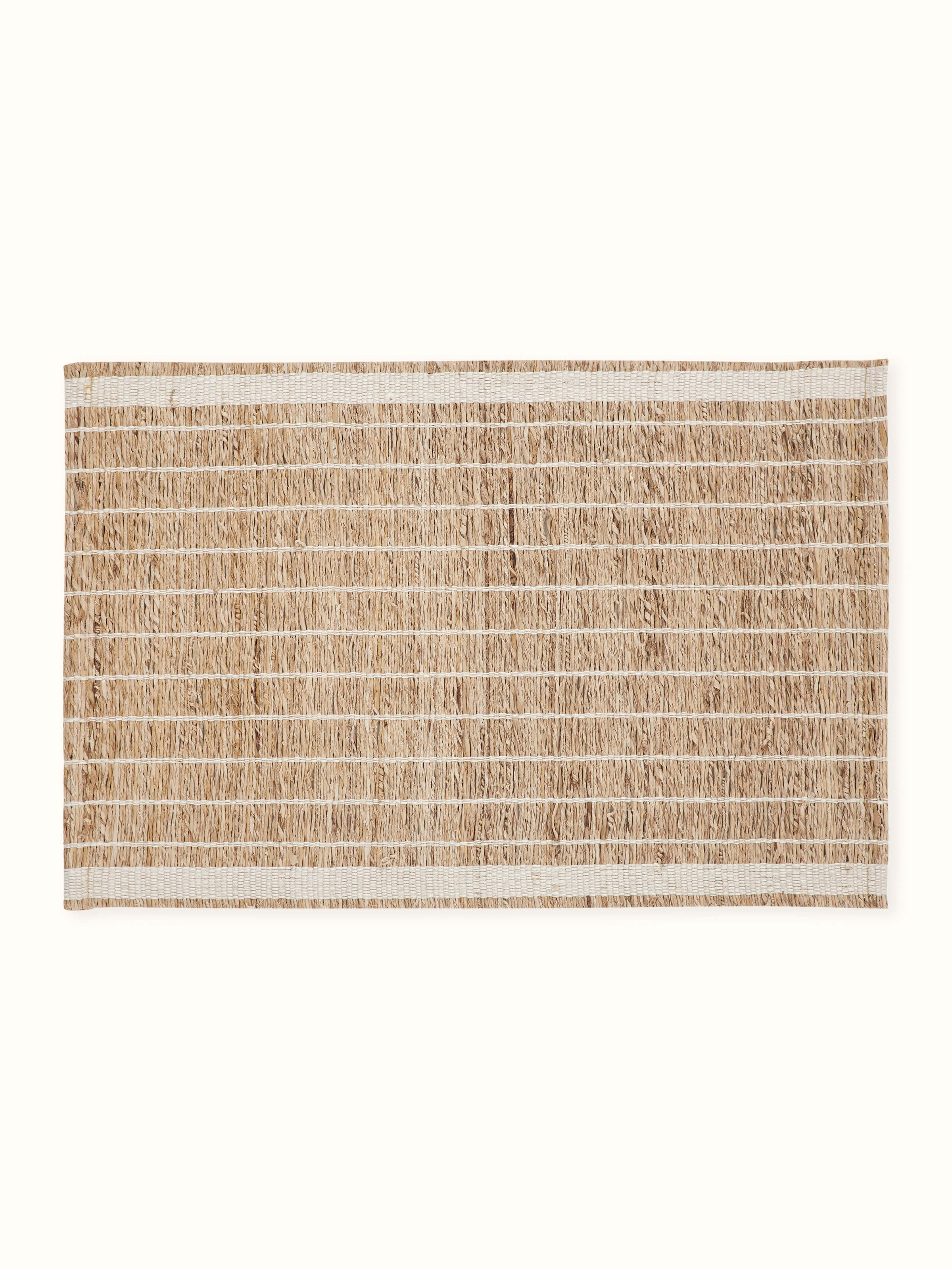 Lifestyle shot showing the table mats styled on a dining setup