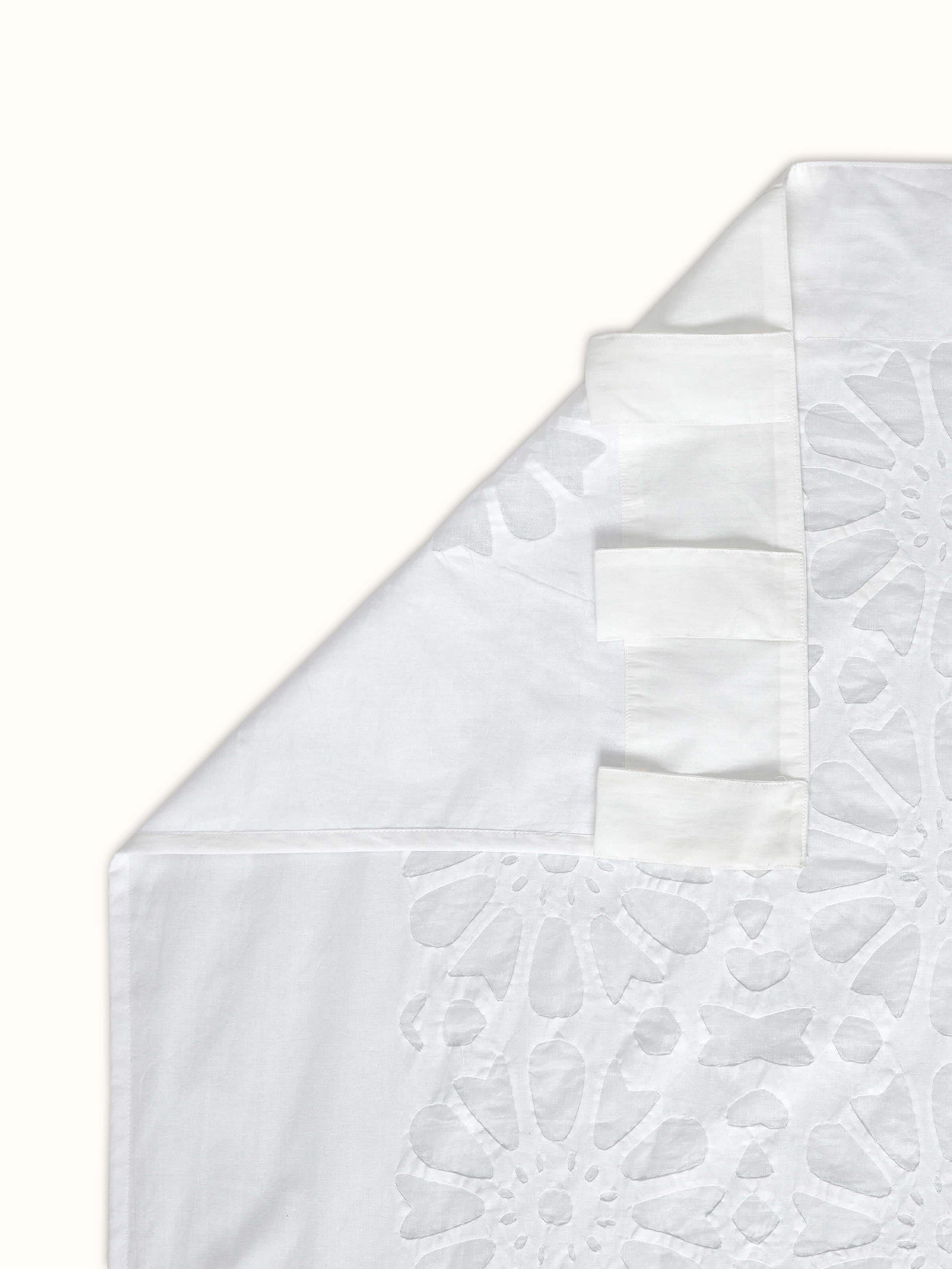 Back view: Back view of curtain displaying light-filtering sheer quality.