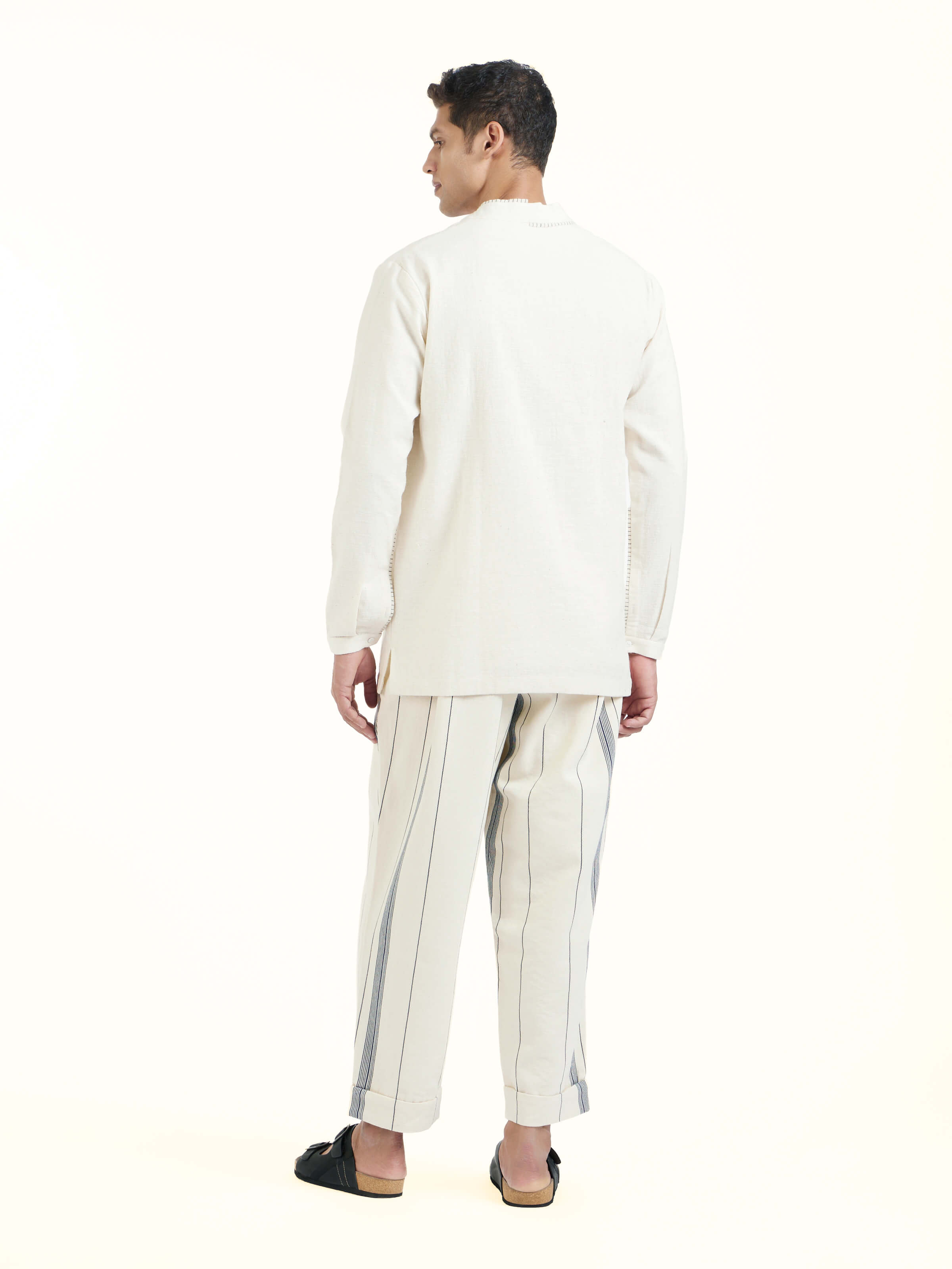 Back view of ivory cotton handloom short kurta displaying clean finish