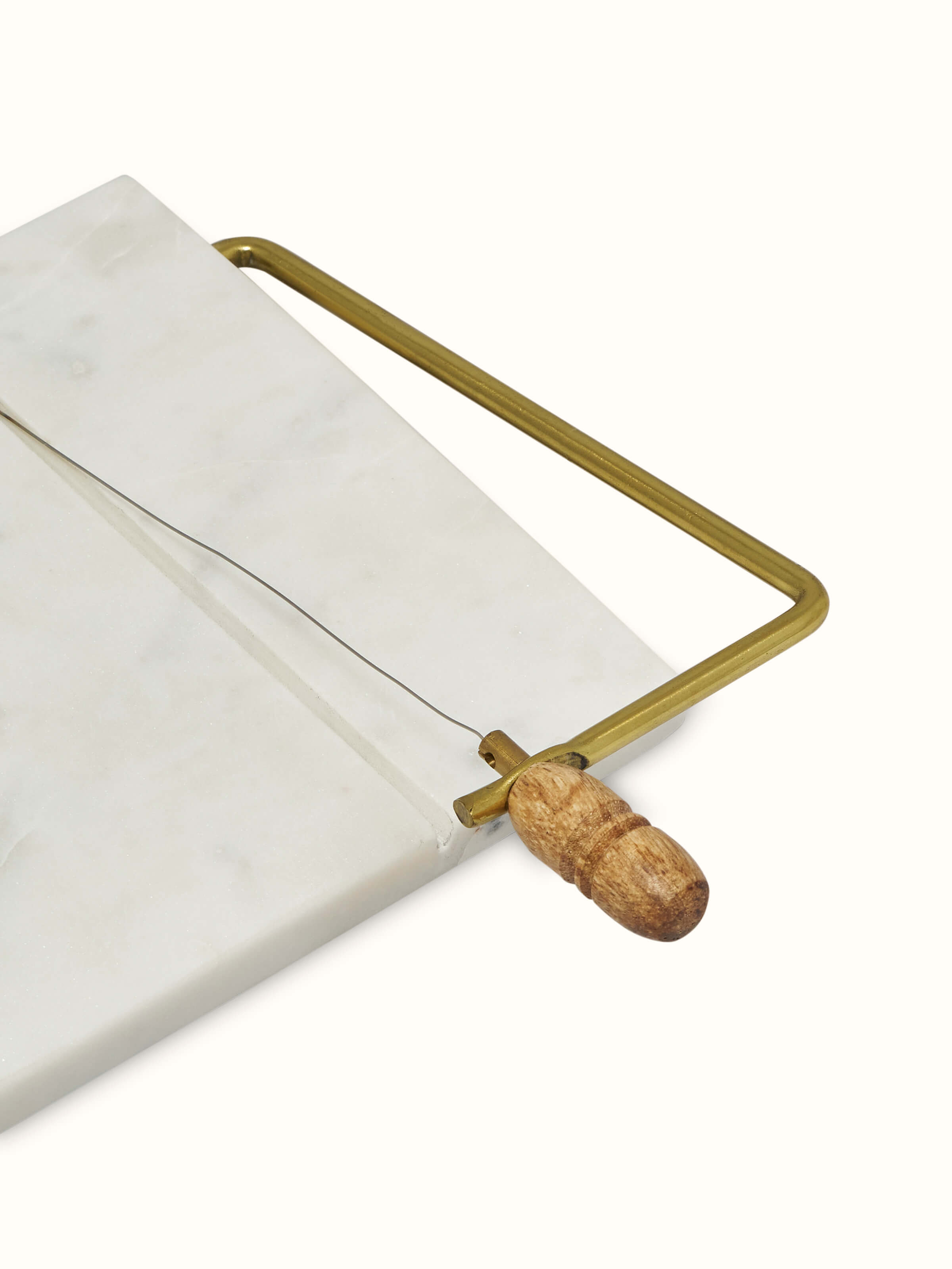 Detailed view of Marble Inlaid Cheese Board by Swadesh, focusing on the fine marble inlay and smooth texture of the cheese board.