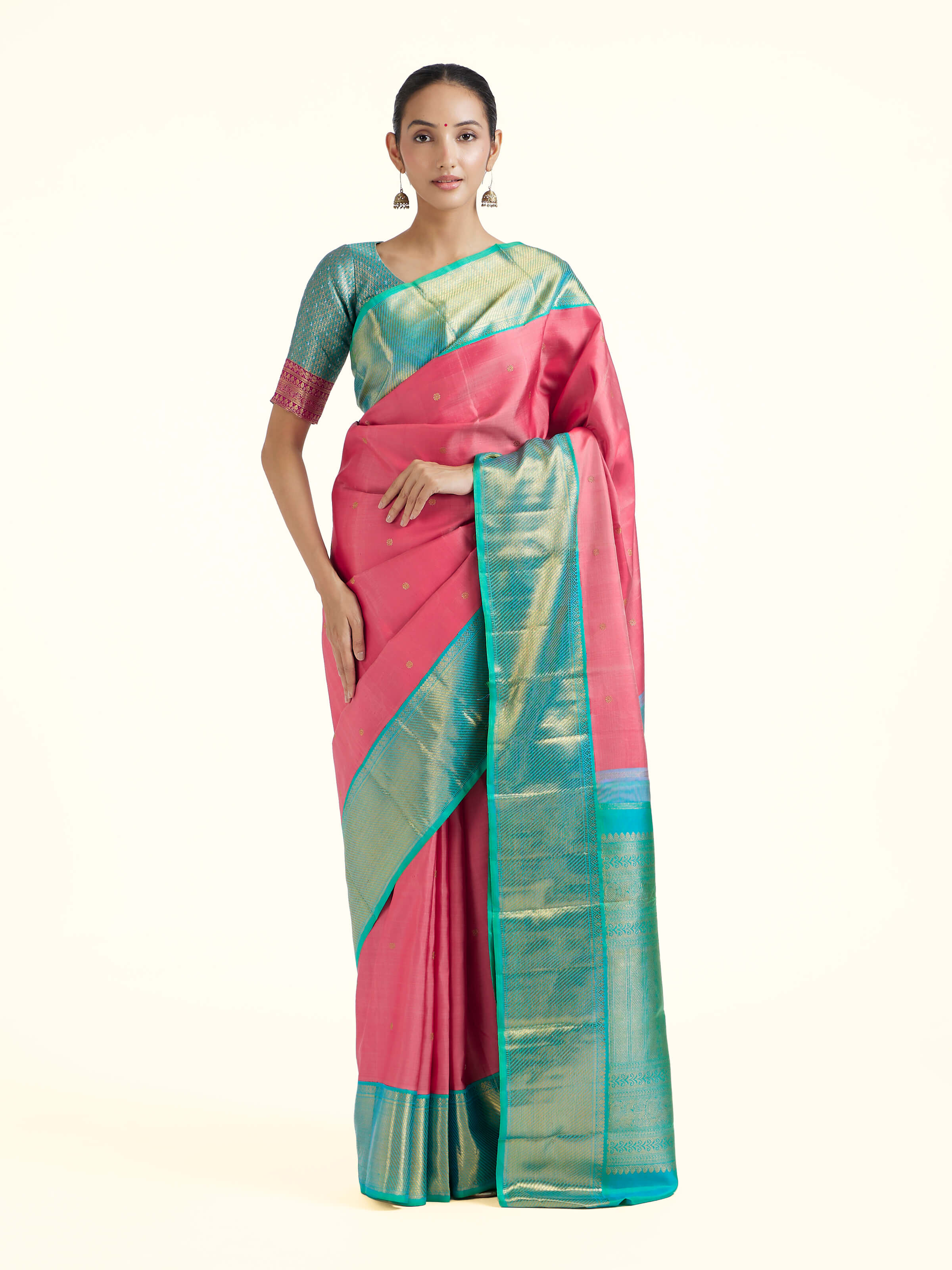 Front view of wine silk Kancheepuram saree with rich zari woven motifs