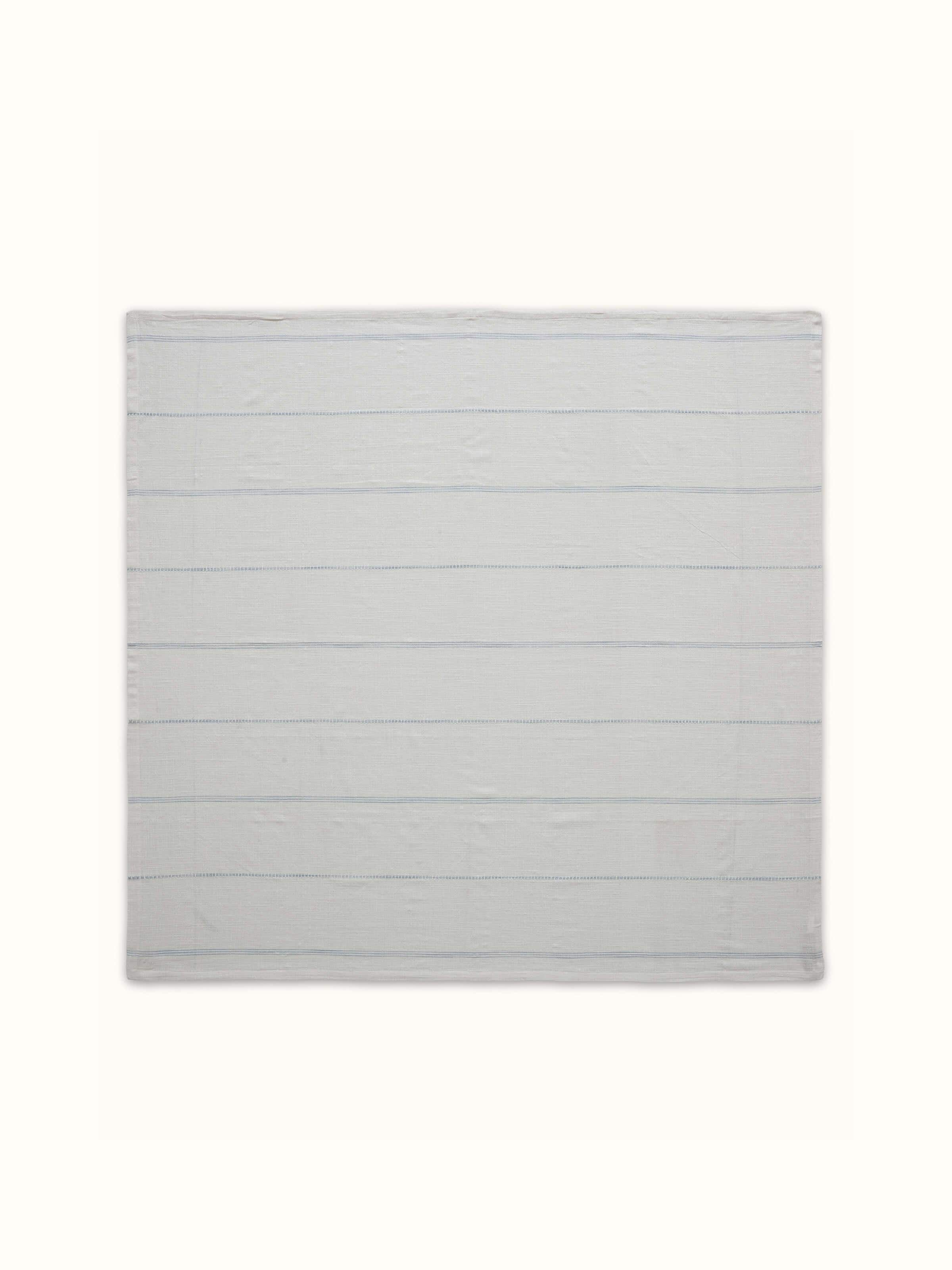 Alternate front view of Arth light blue stripe cotton handloom table cover showing full surface and subtle stripe design.