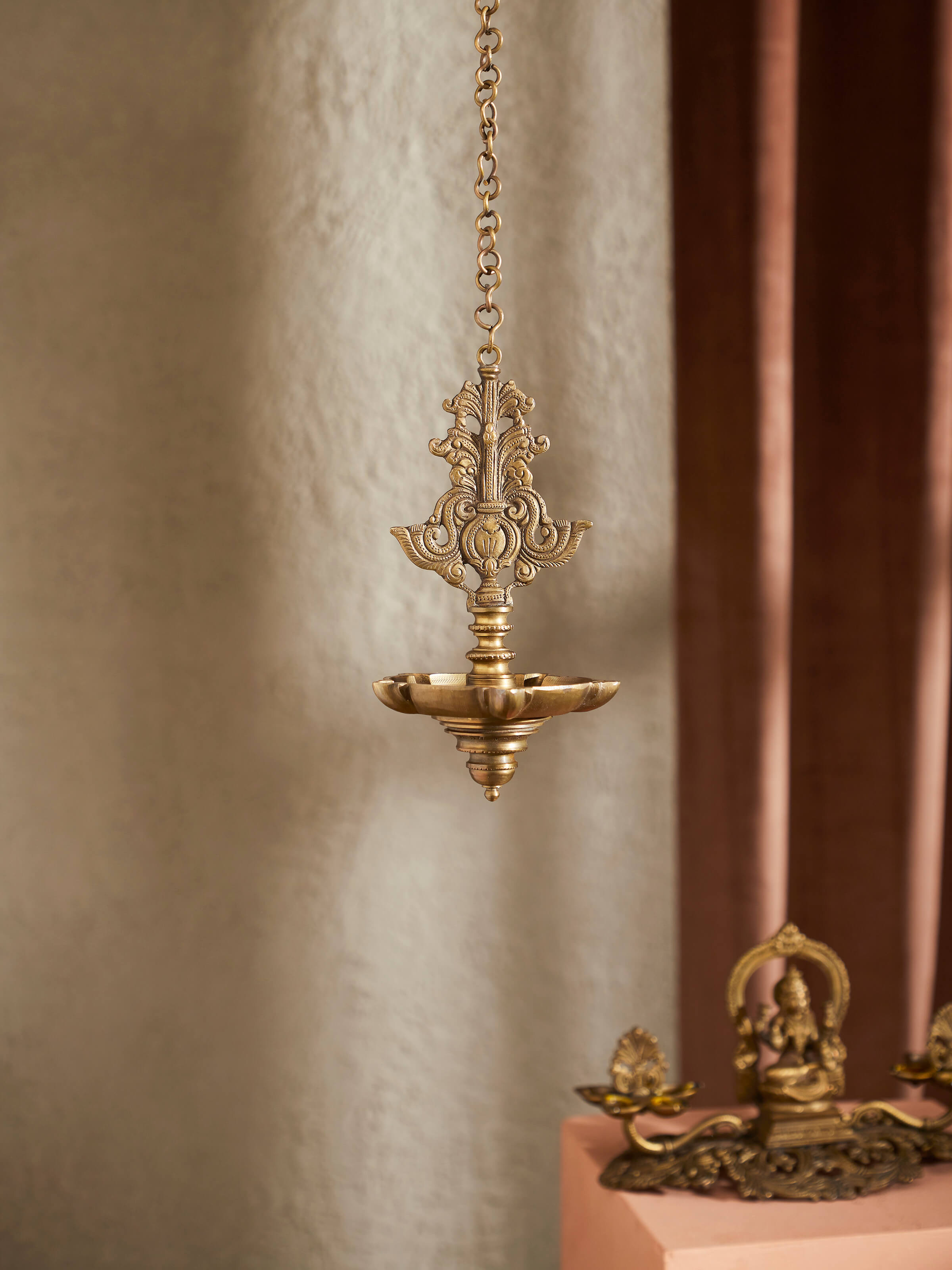 Side view of Polished Casting Hanging Diya, highlighting its traditional style and intricate details