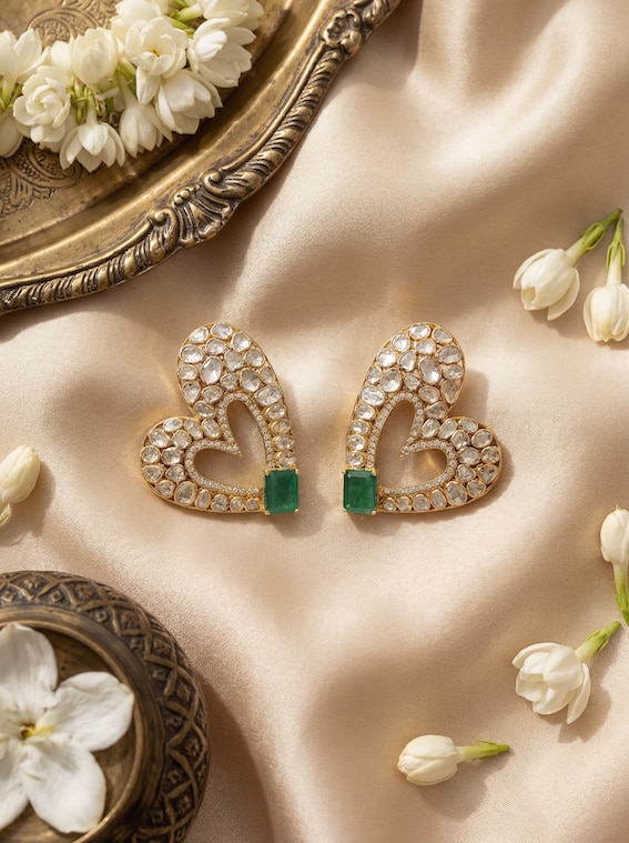 Dank Polki 14 karat gold studs worn on ears – Swadesh
