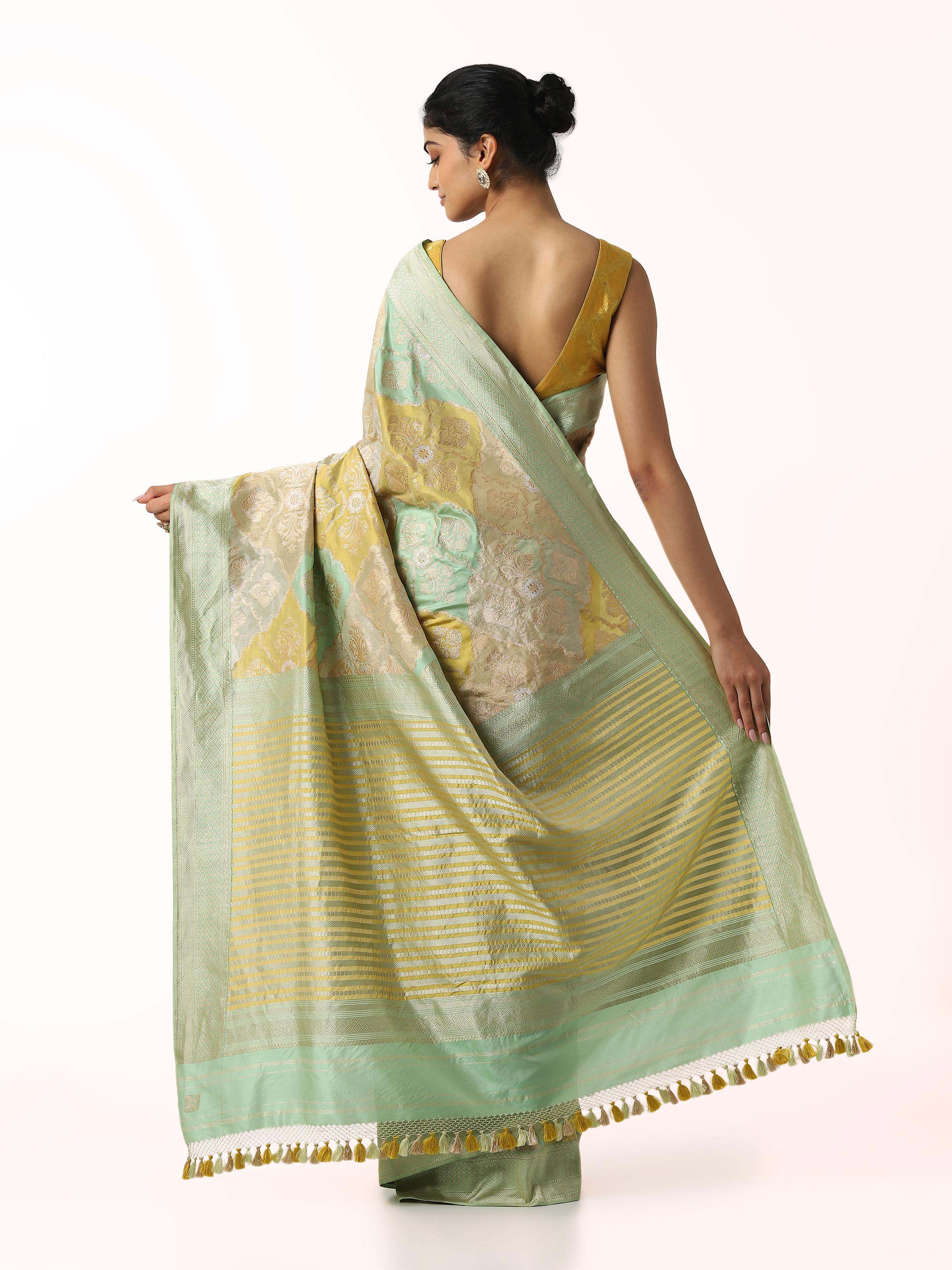 Back view of silk rangkat Banarasi saree displaying ornate pallu design