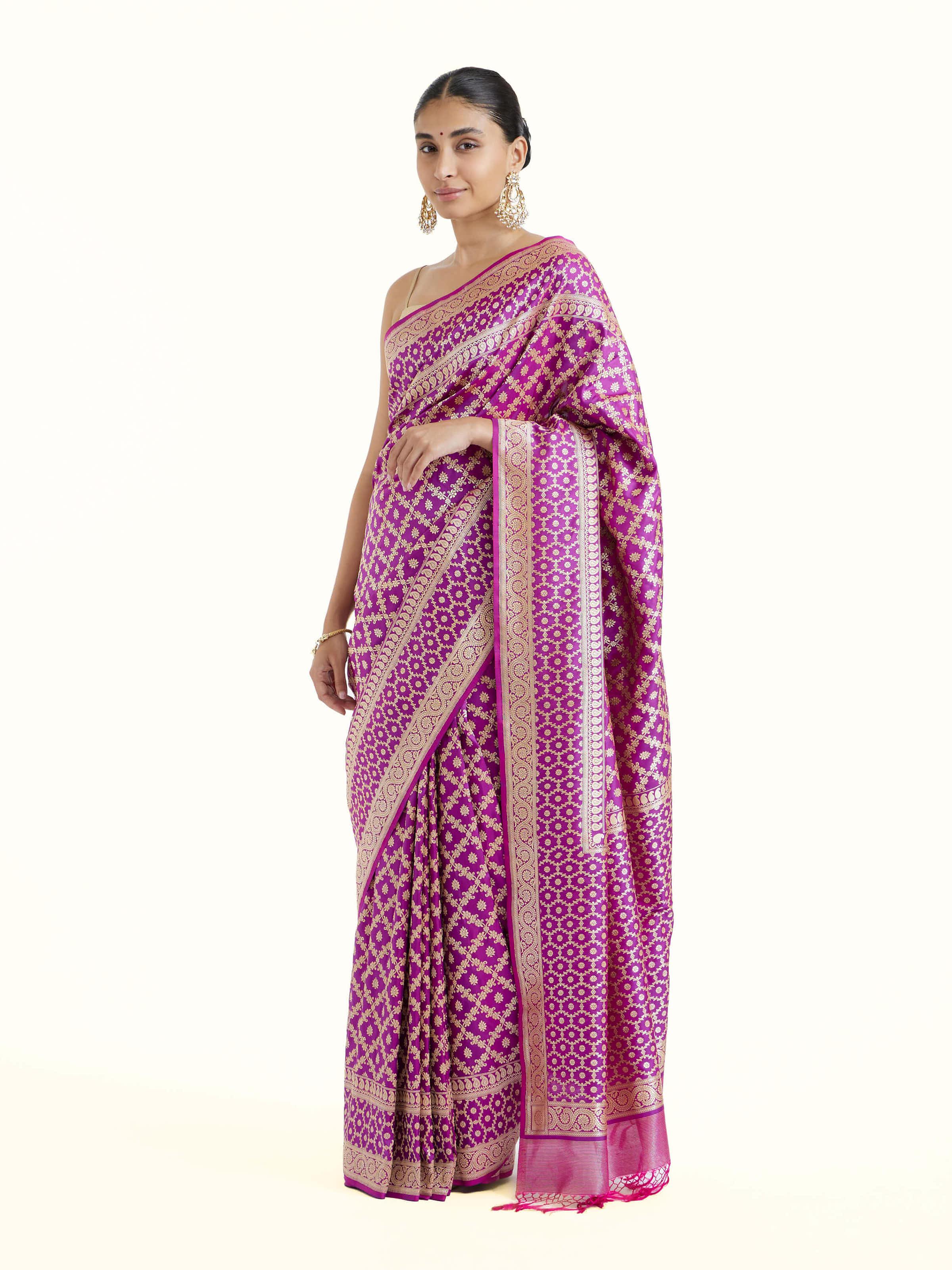 Side view of purple katan mulberry silk Banarasi saree showcasing regal drape