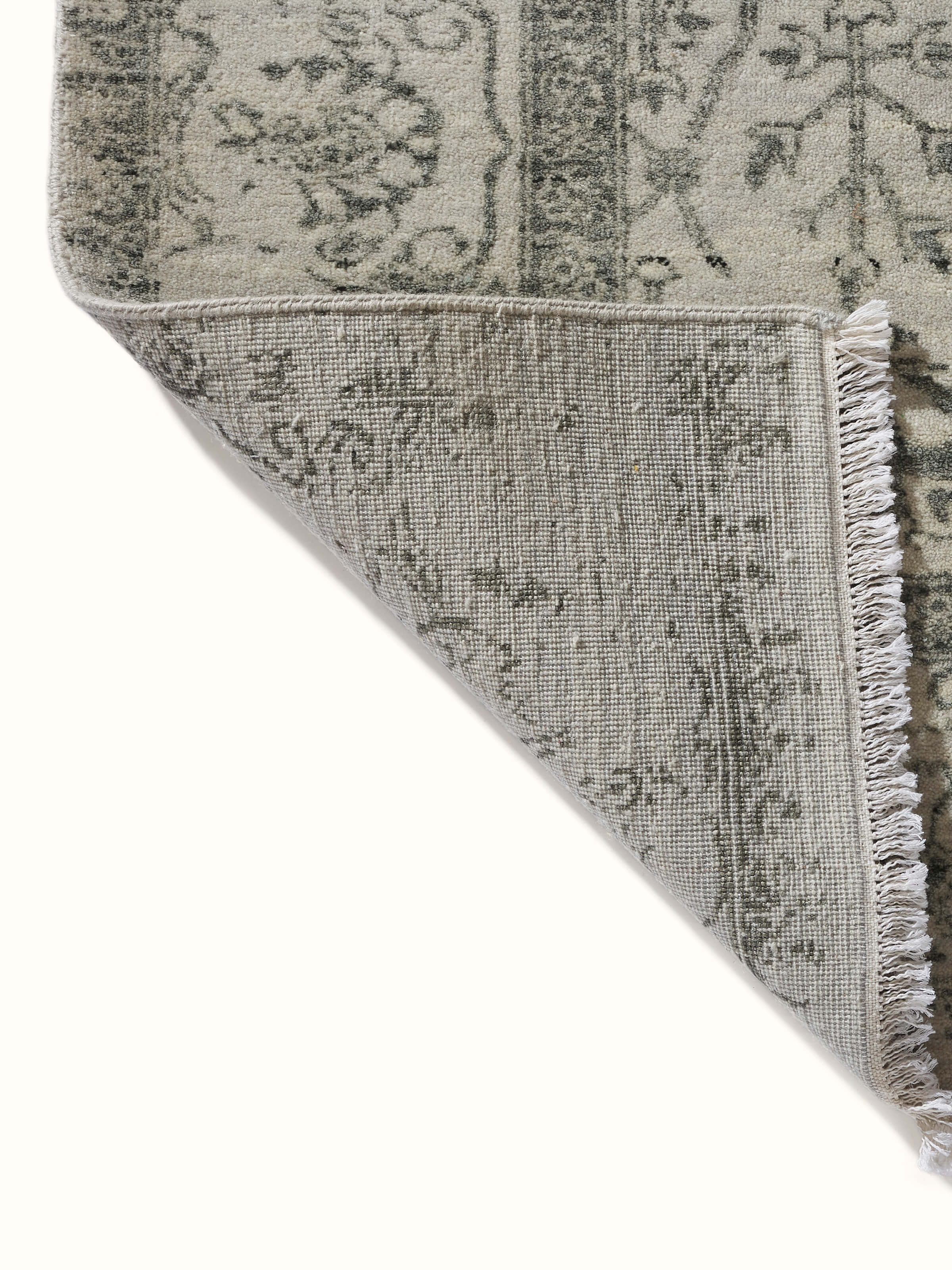 Rear view showcasing hand-knotting on modern grey Agra wool-viscose rug