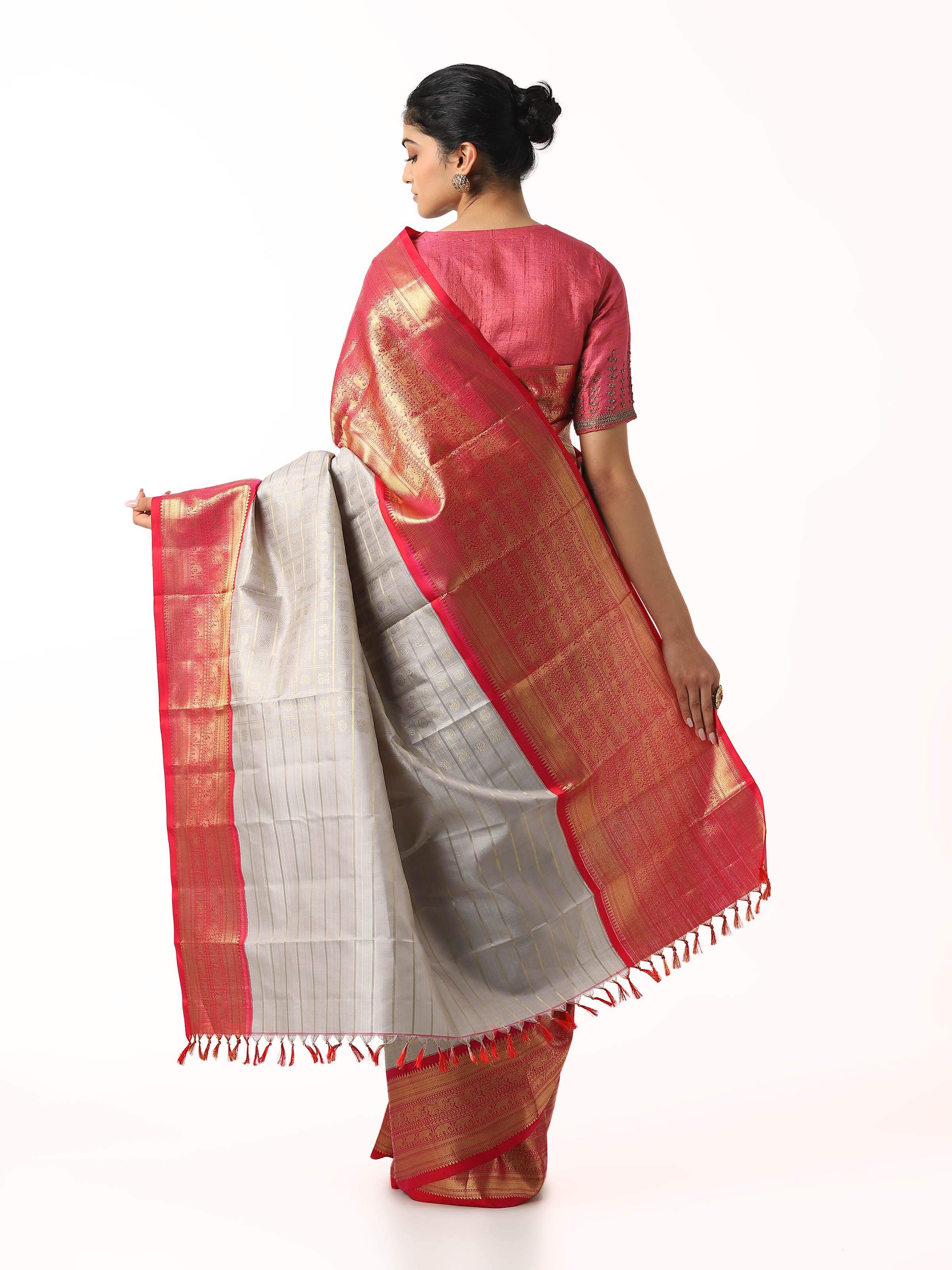 Back view of grey silk Kancheepuram saree displaying ornate pallu