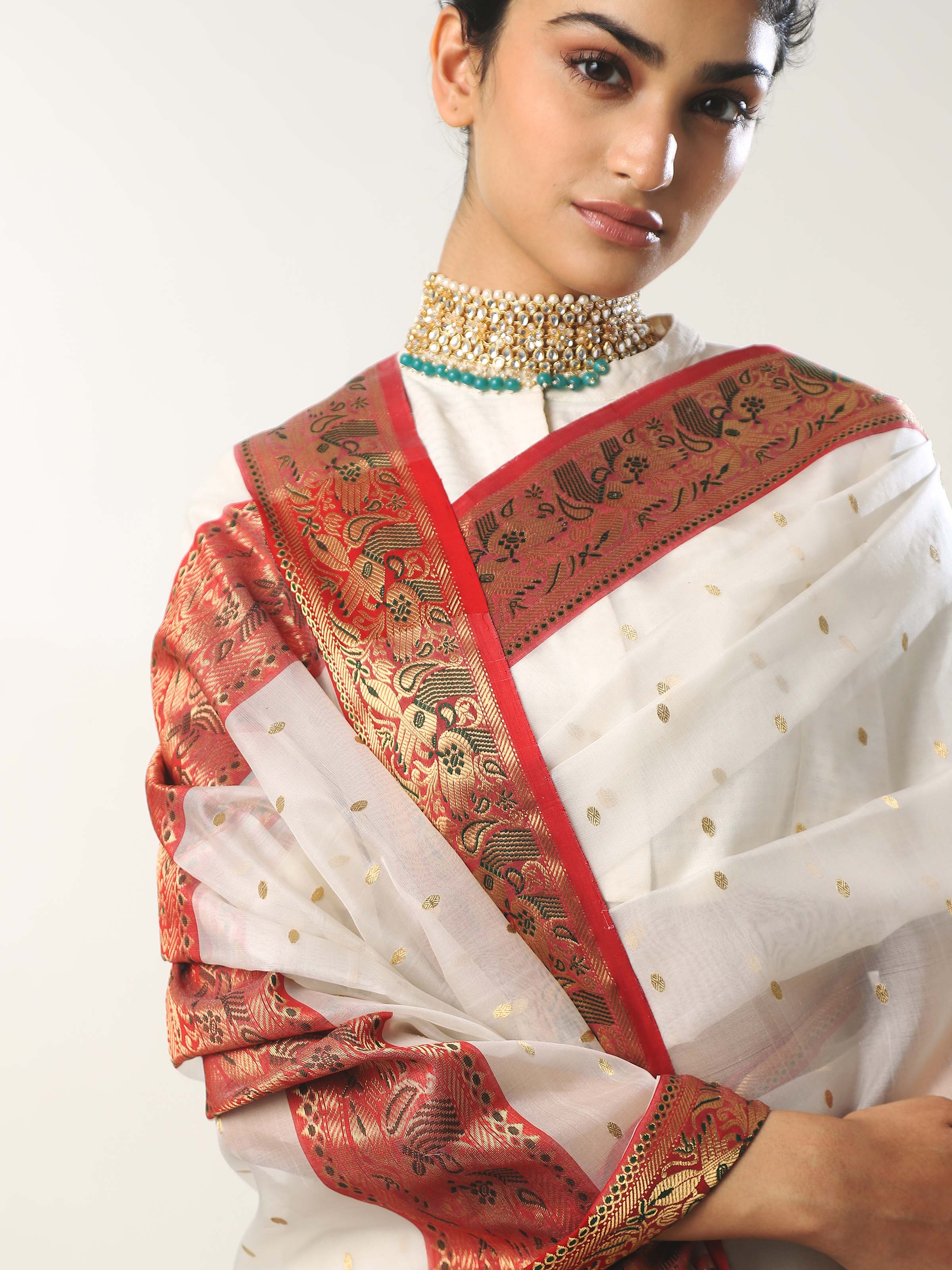 Detailed side view of white cotton silk Chanderi saree showcasing fabric finesse