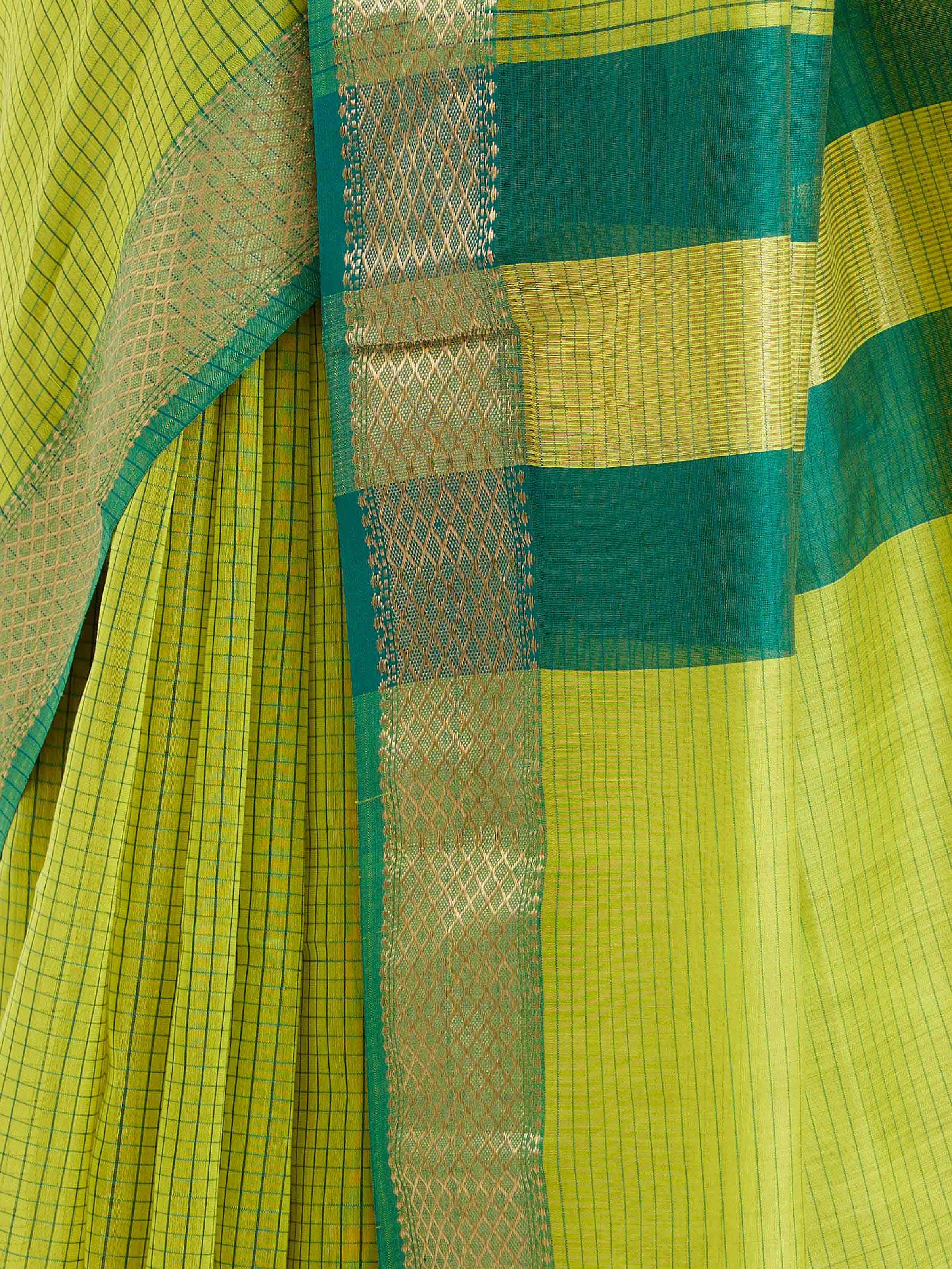 Detail view of green cotton silk Maheshwari saree showcasing fabric blend and craftsmanship