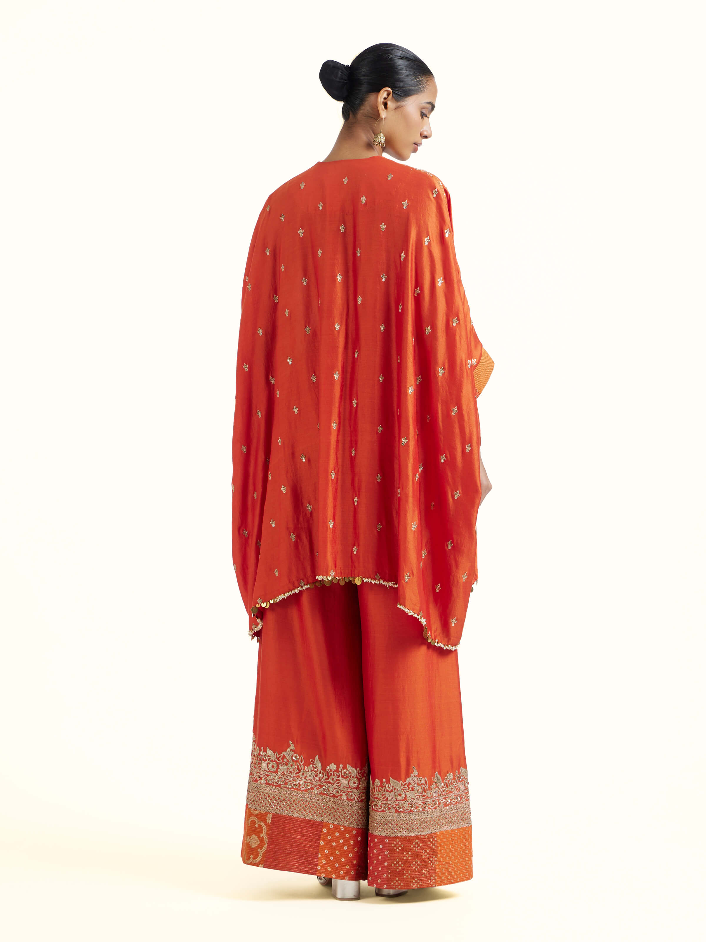 Back view of rust silk hand embroidery co-ord set displaying design finish