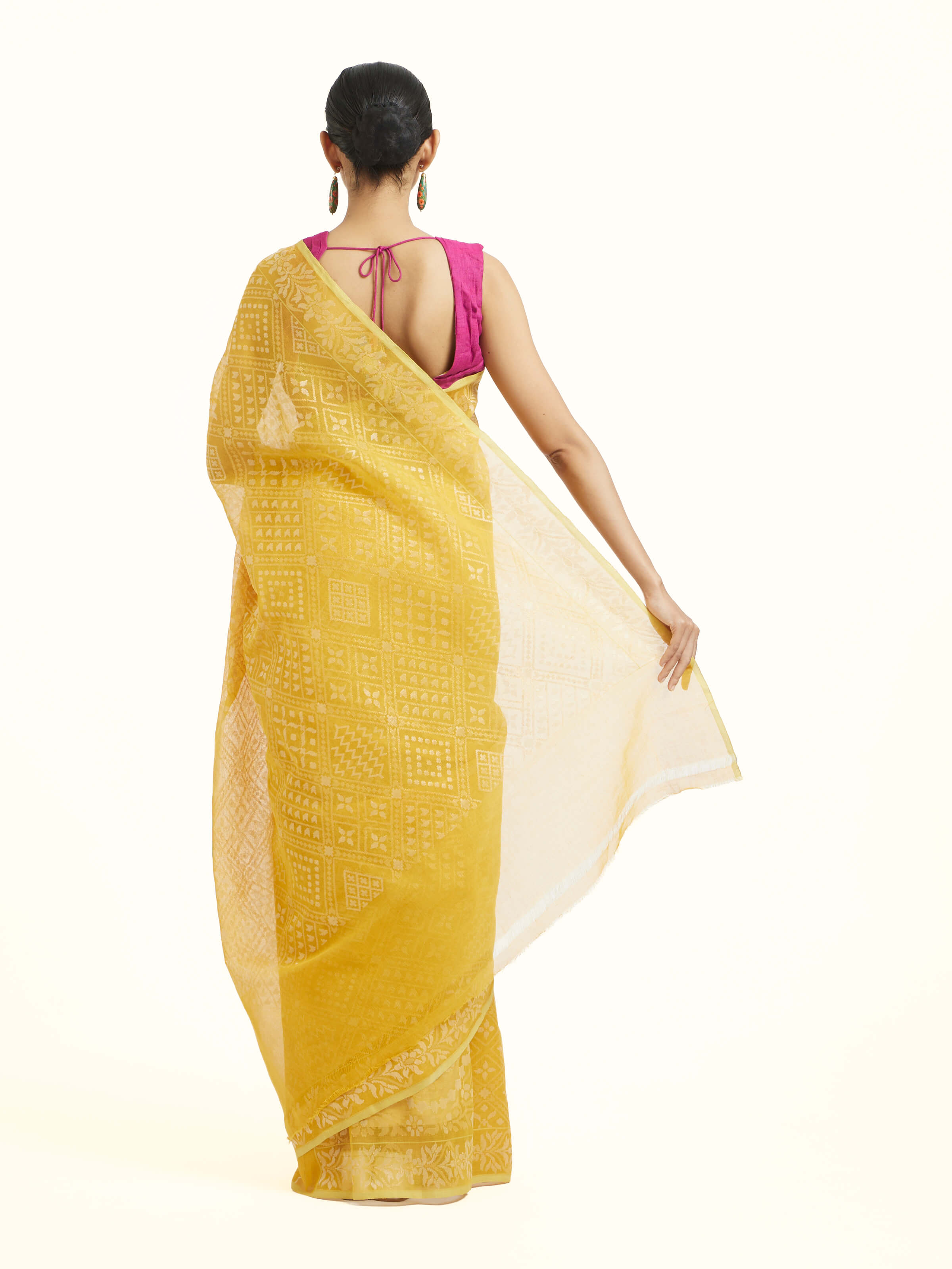 Back view of yellow cotton Awadh Jamdani Banarasi saree displaying pallu design