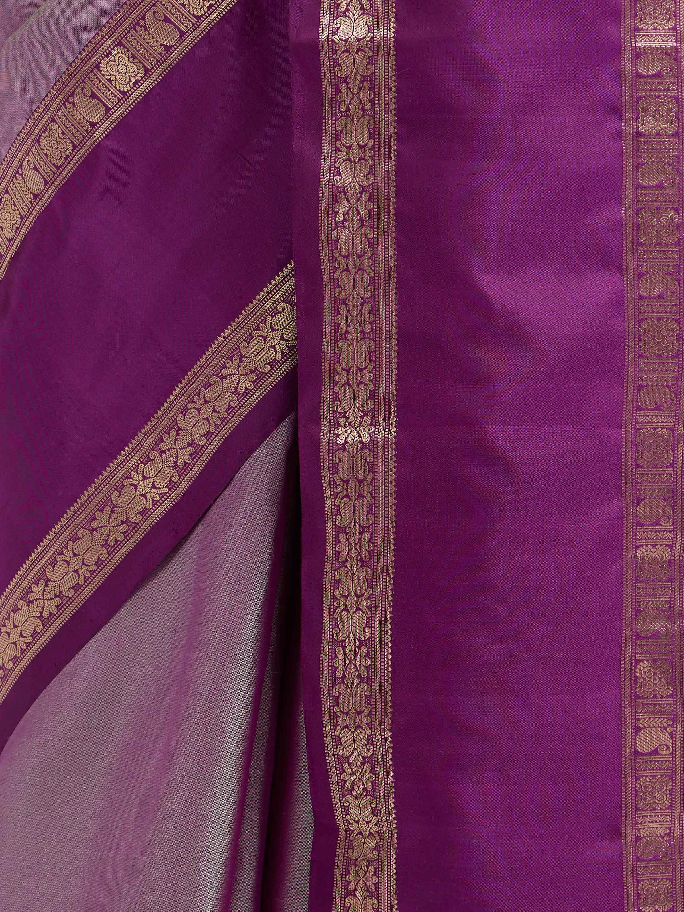 Detail view of purple silk Kancheepuram saree showing silk texture and zari craftsmanship
