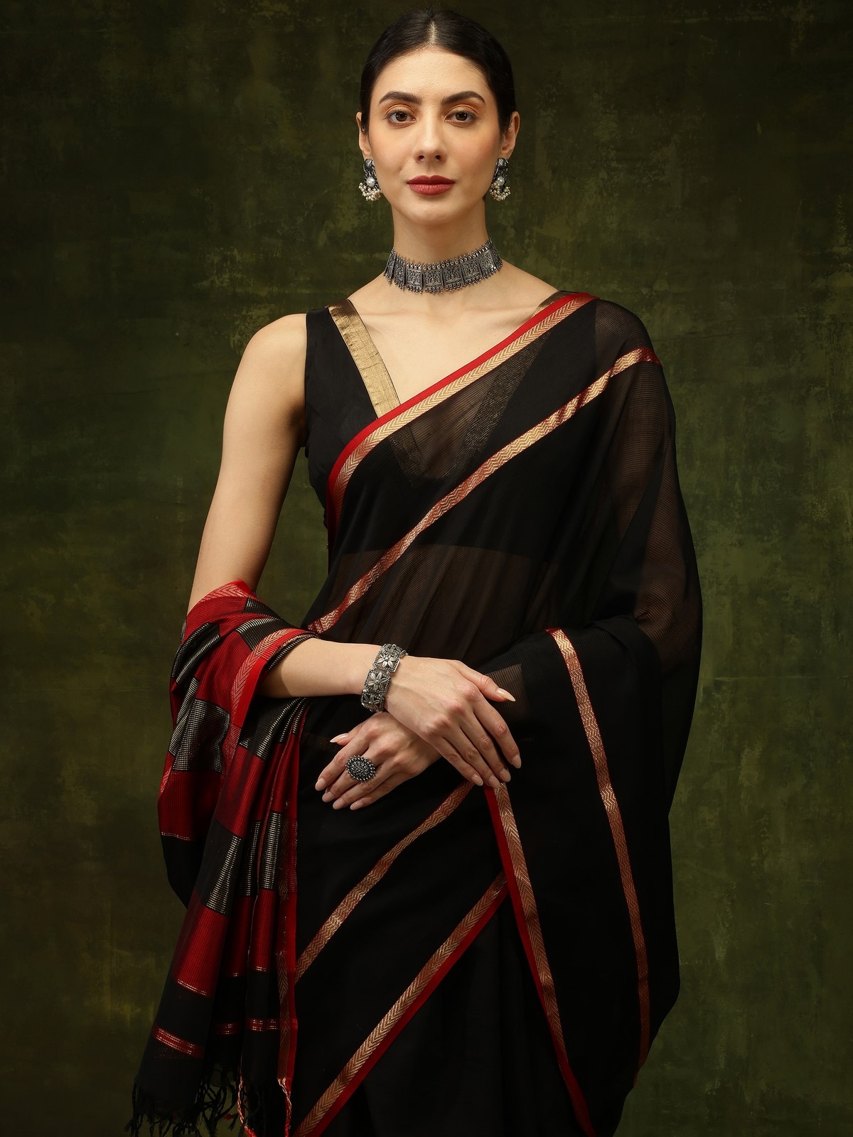 Detail view of black cotton silk Maheshwari saree with fabric texture and weave