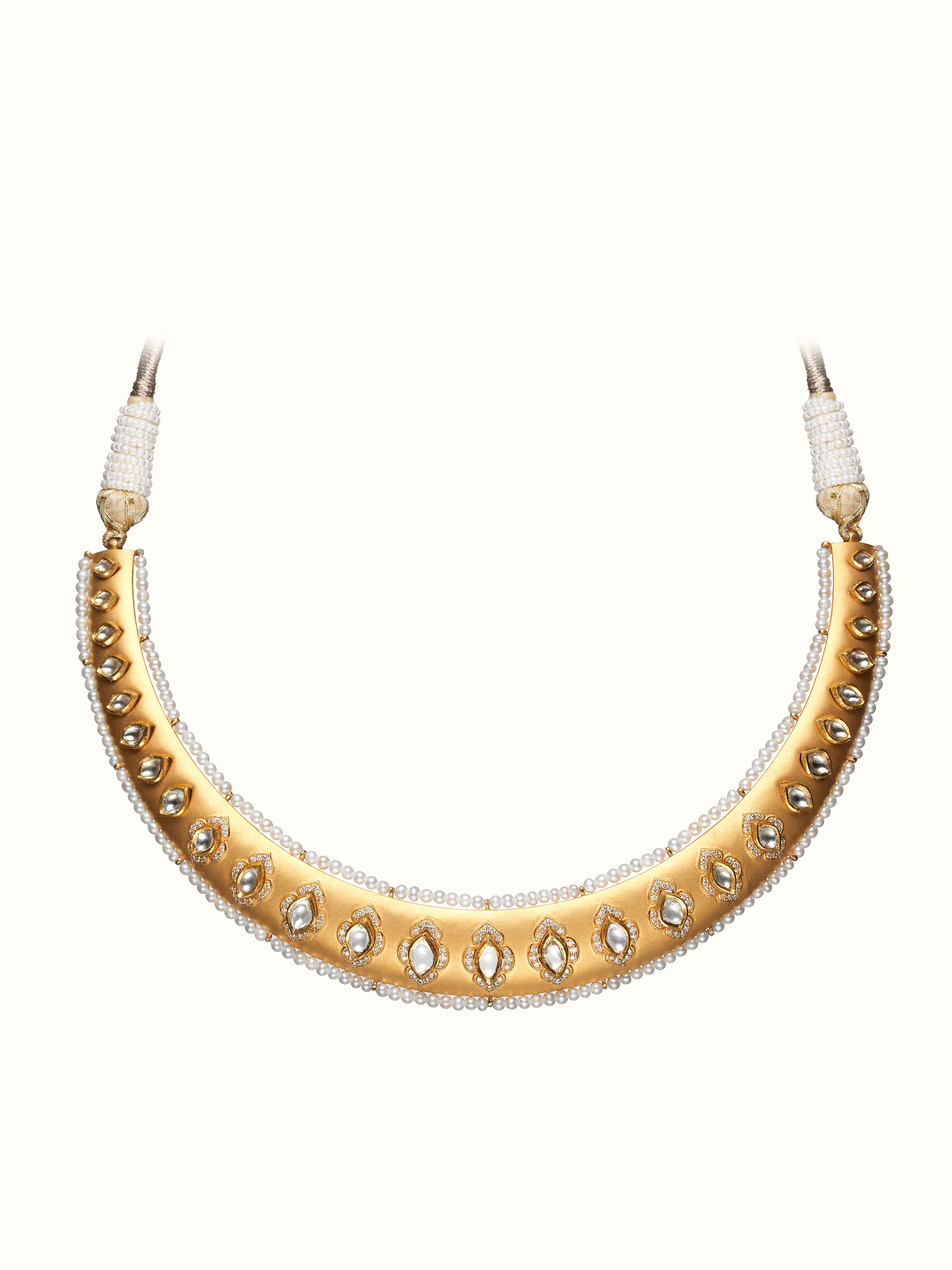 front view of dank polki 14 karat gold collar necklace with intricate stone work