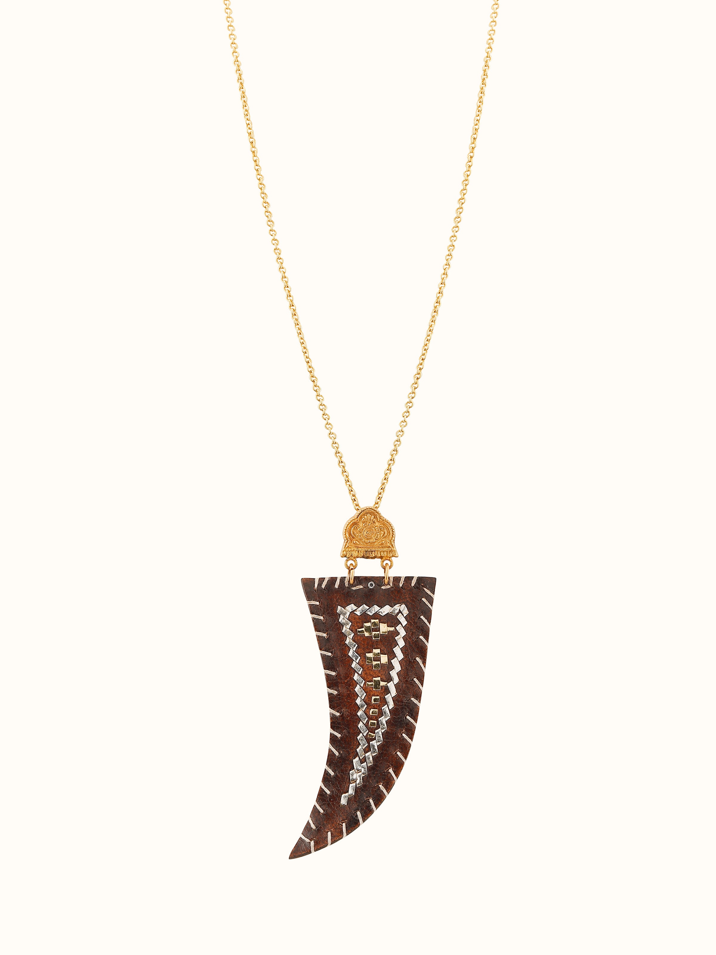 Front view of Kutch leather silver pendant showcasing embossed textures and ethnic charm