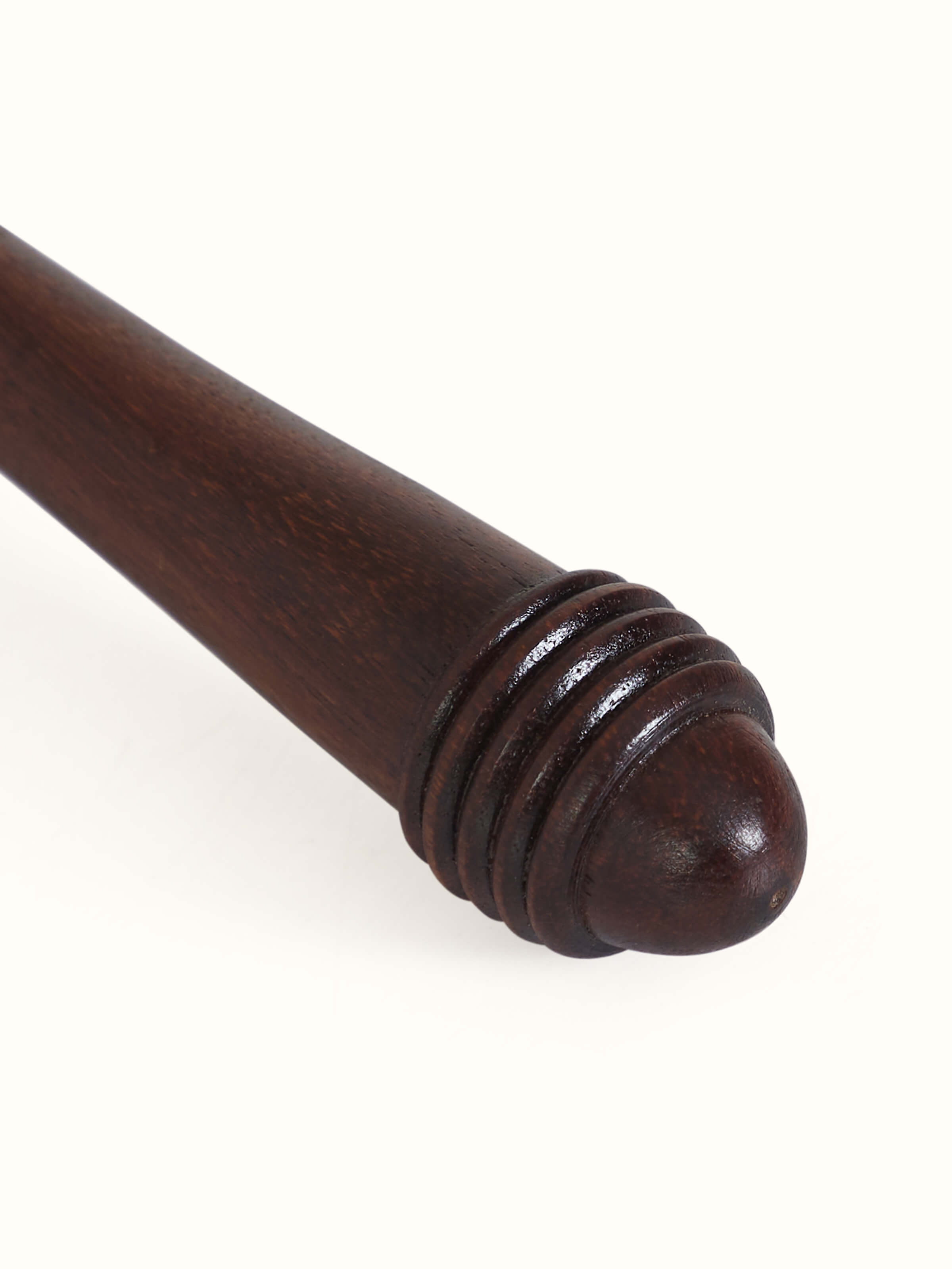 Close-up detail of Thathera craft brass pooja bell highlighting workmanship