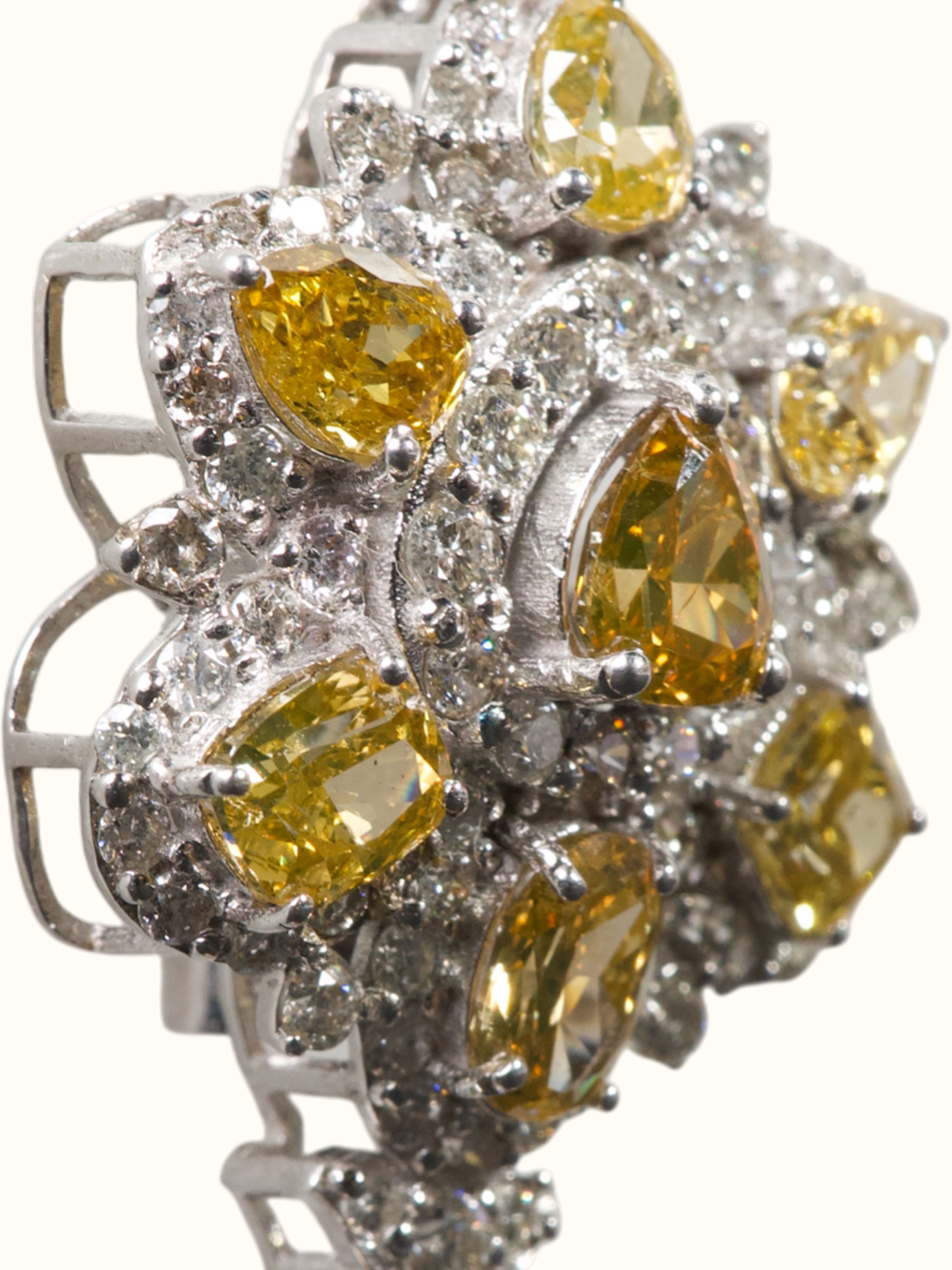 detail view of open setting gold brooch pin pattern