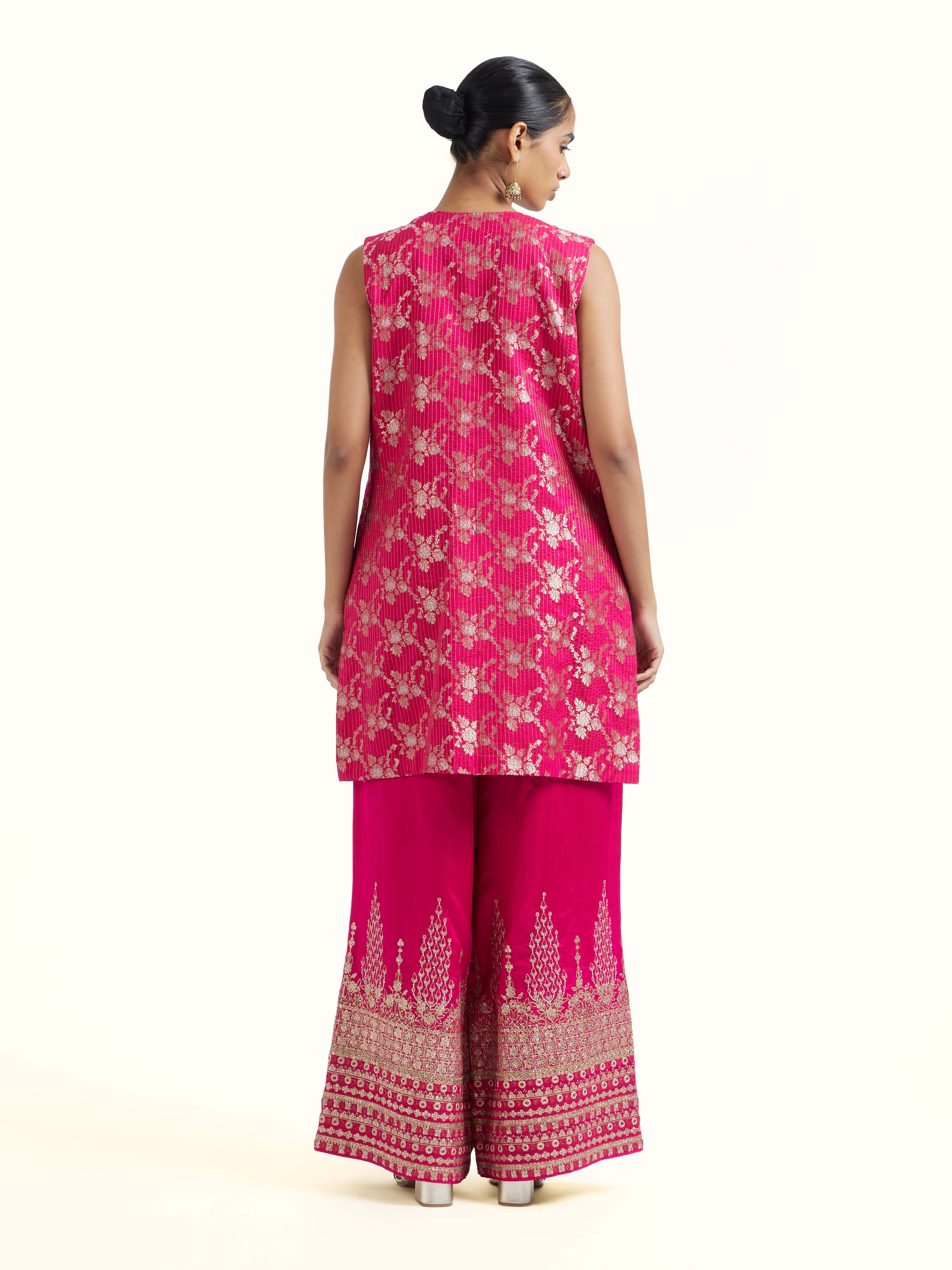 Back view of pink silk hand embroidery kurta set with neat finishing