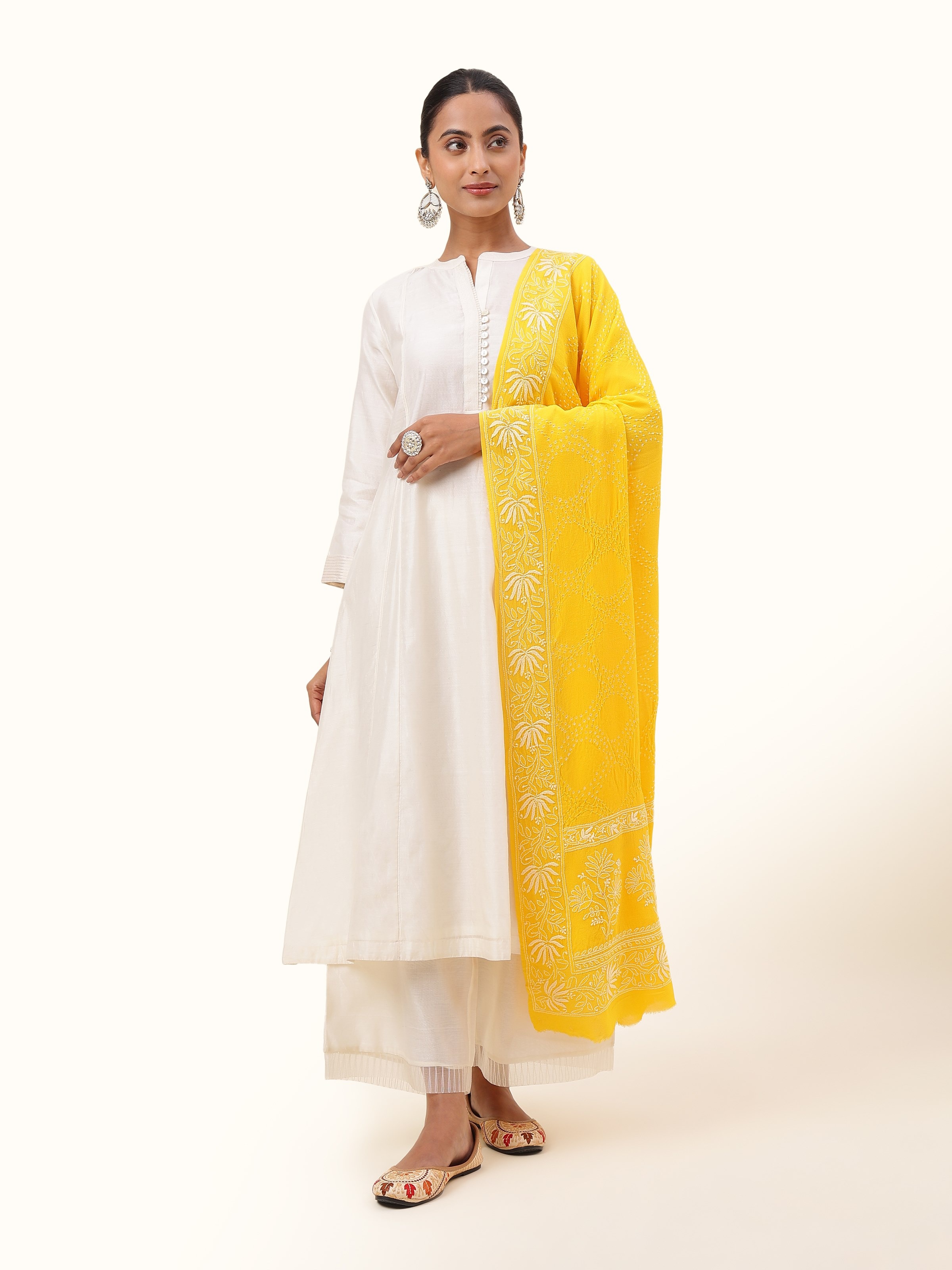 Front view of yellow georgette bandhani tie and dye dupatta displaying full design