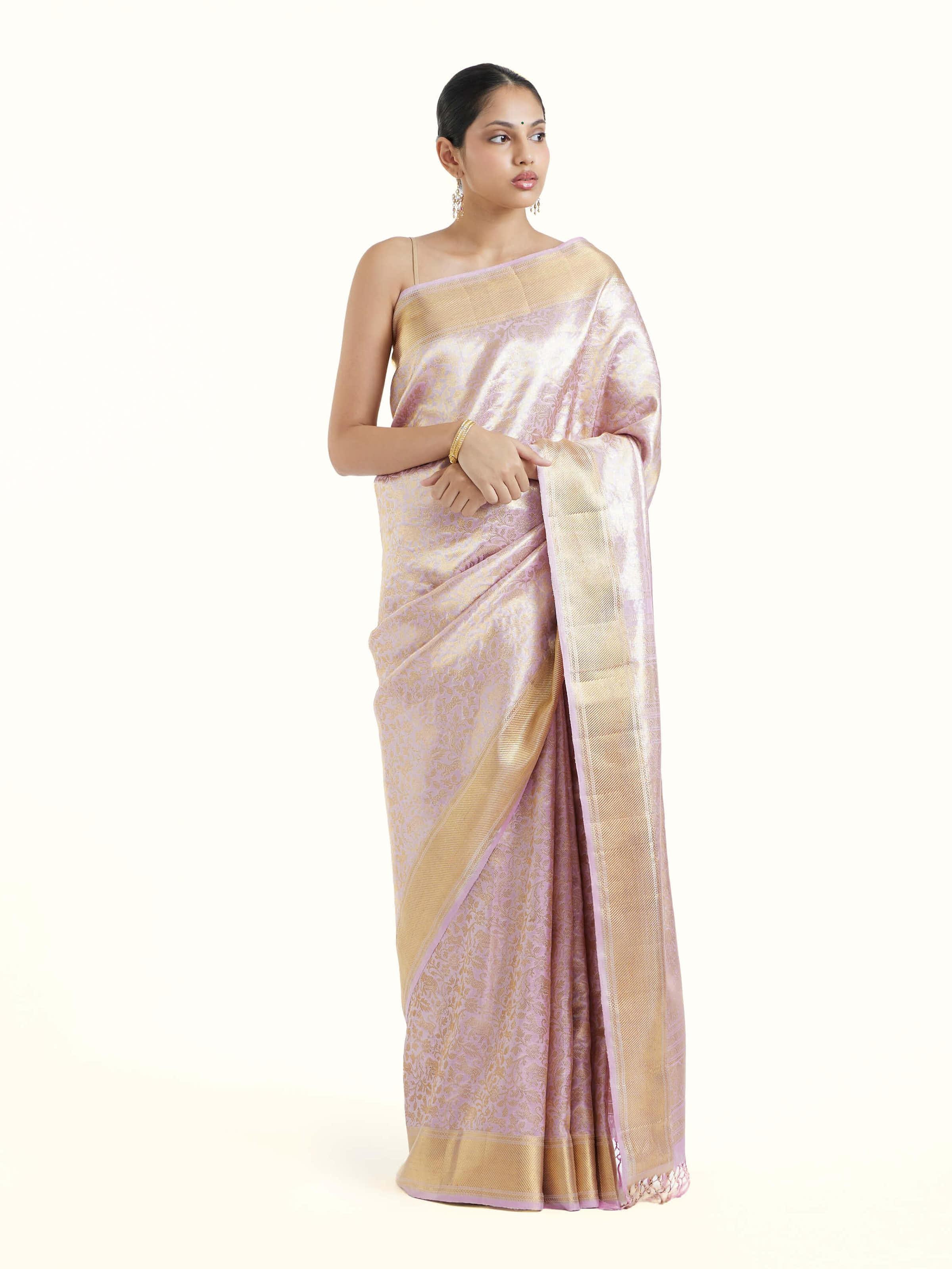Front view of lavender silk Kancheepuram saree with elegant zari motifs