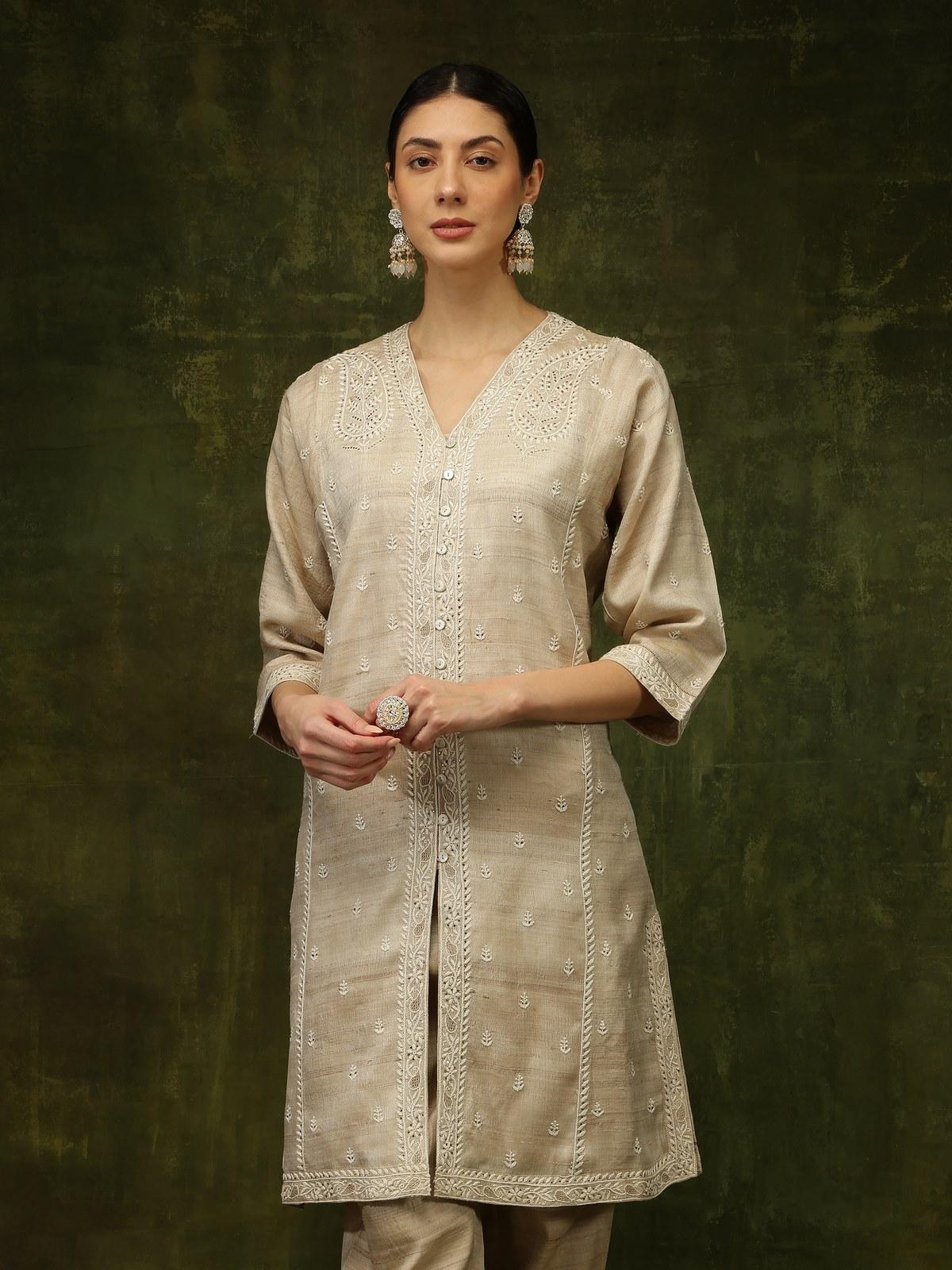 Alternate angle capturing the flowing Choga style and subtle texture of the fine Tussar silk.
