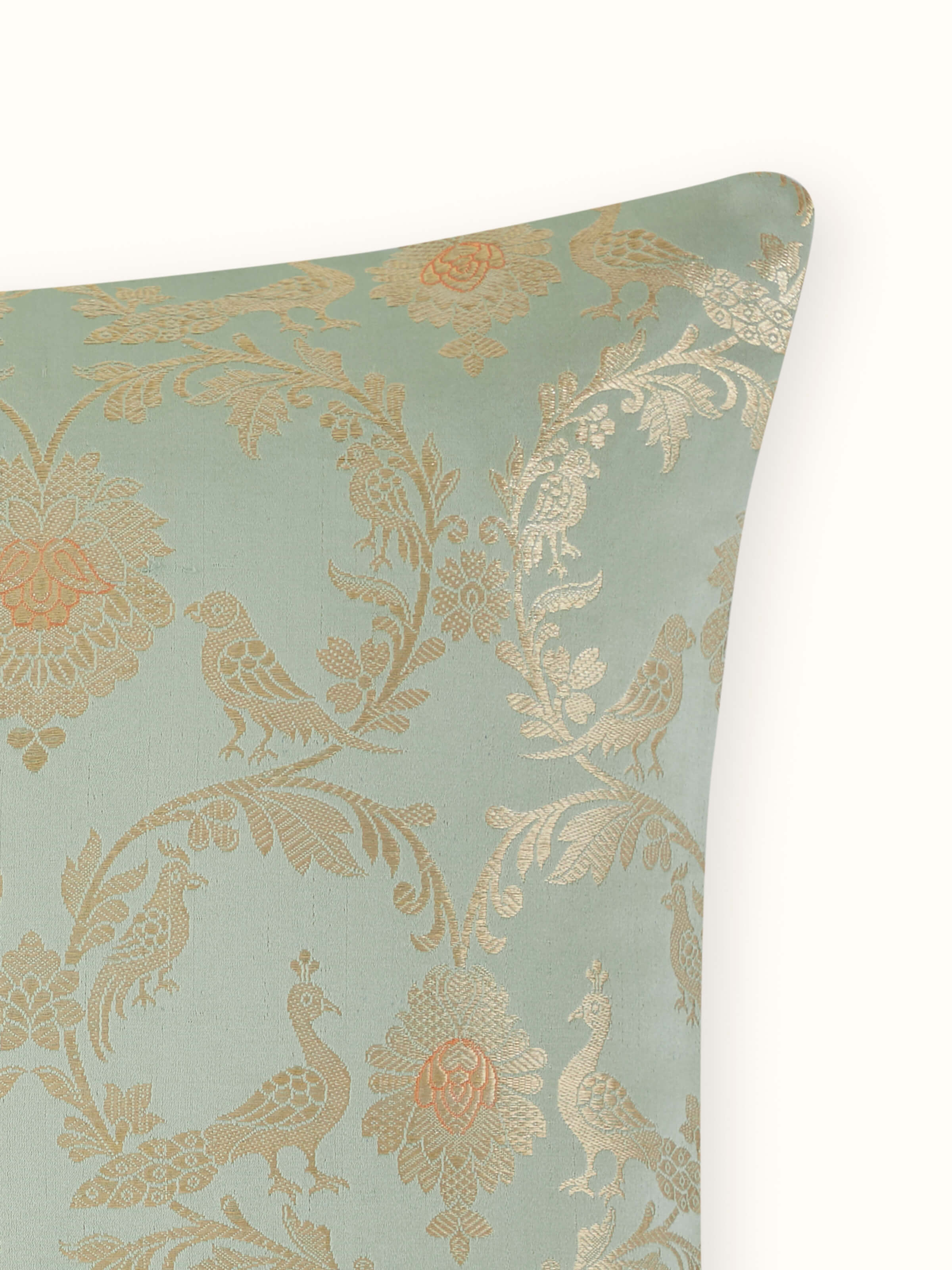 Close-up of cushion cover’s fine detailing and lustrous finish.