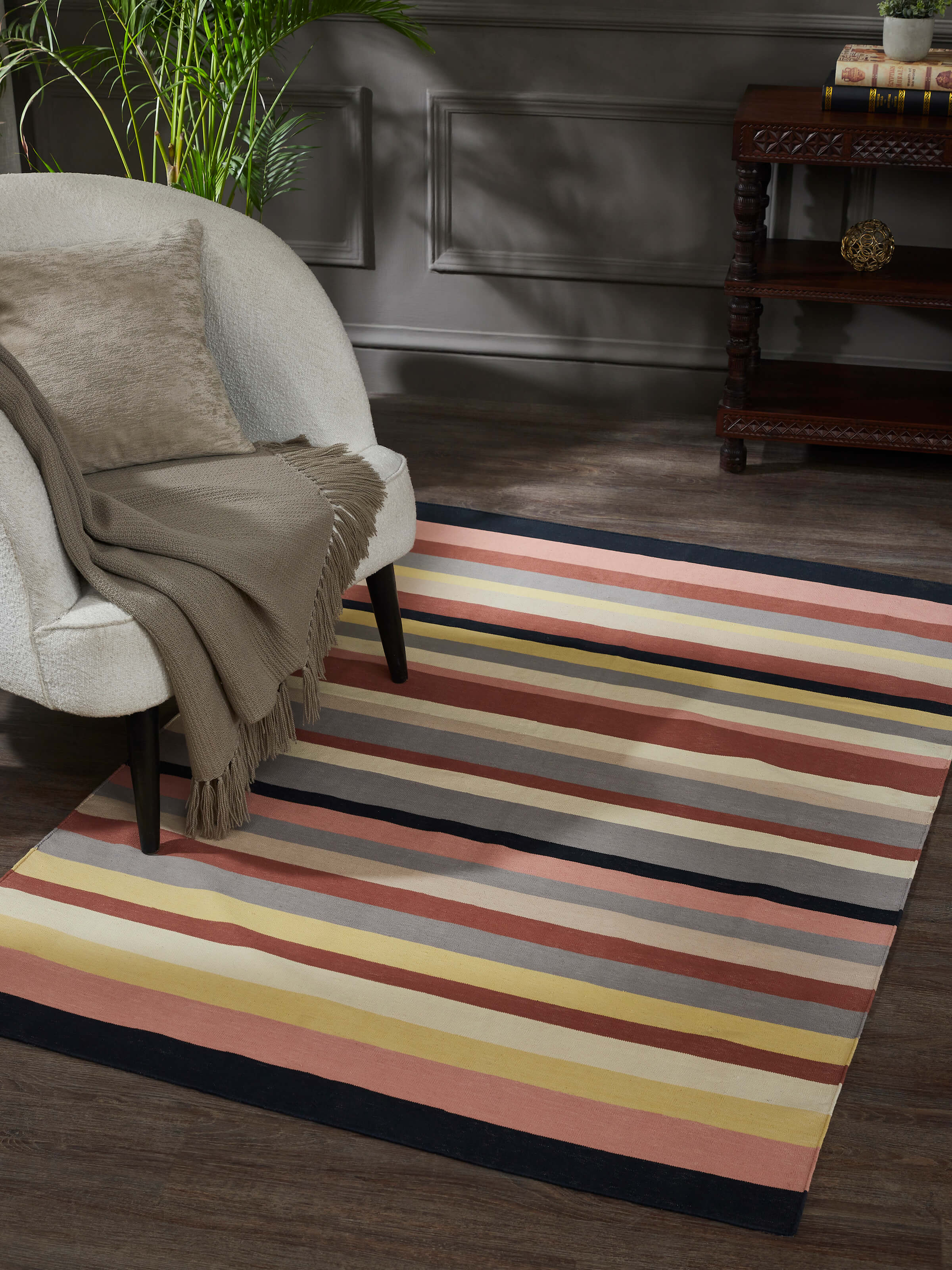 Living room setting featuring the dhurrie’s bold modern design.