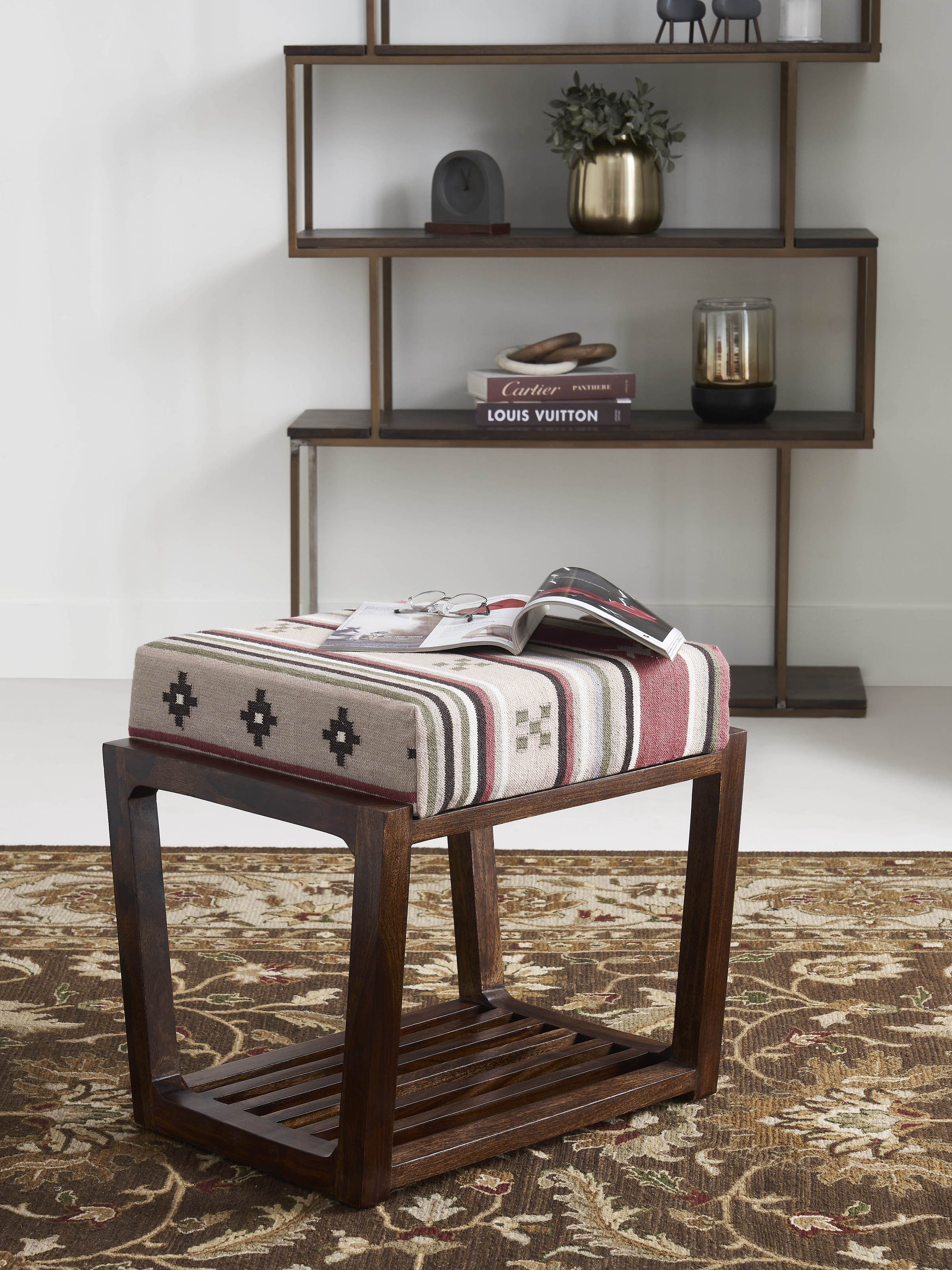 Side view of Swadesh Panja Dhurrie Upholstered Sheesham Wood Stool with slated base showcasing its woven upholstery