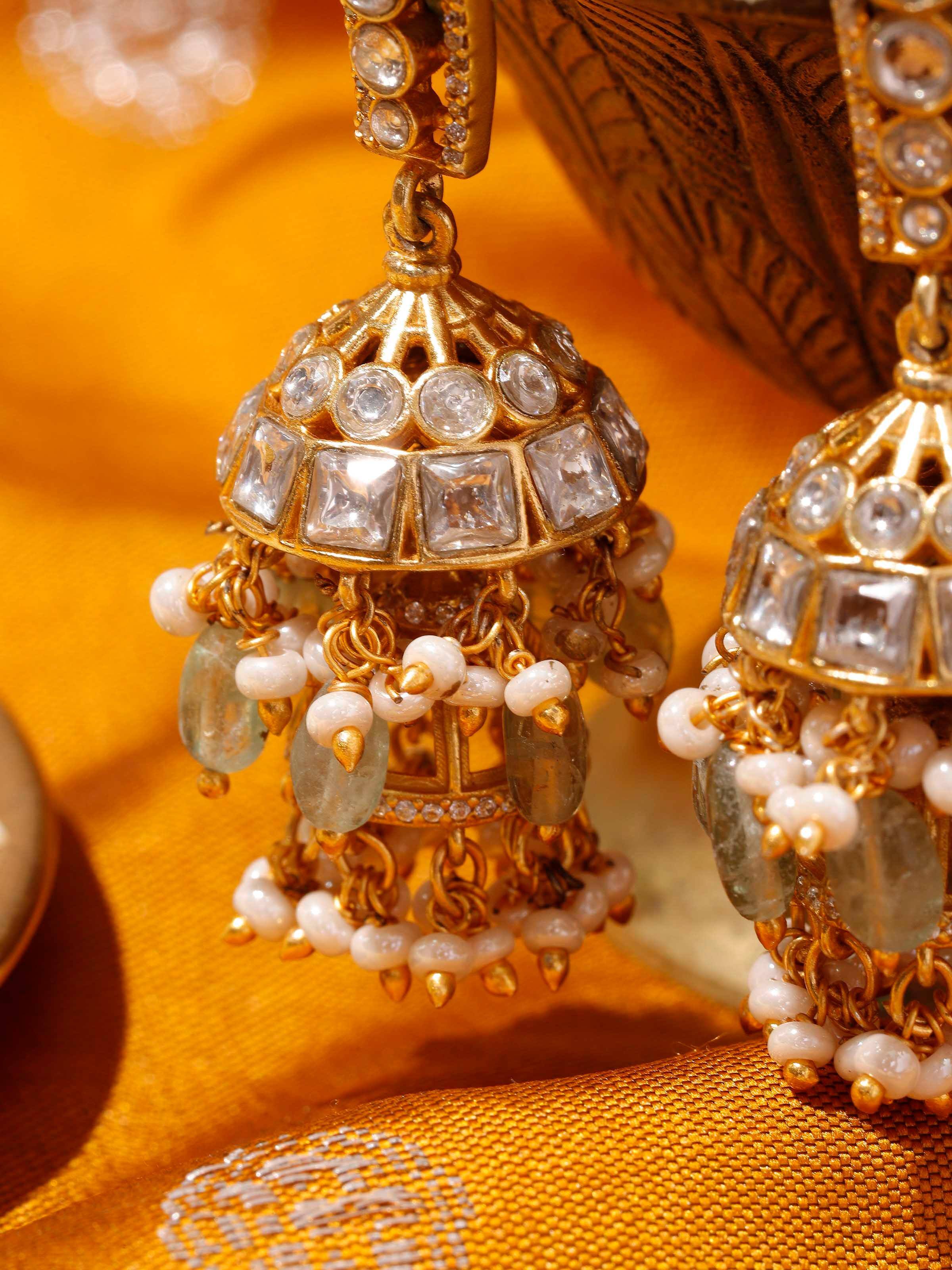 Detail view of Silver Smithing jhumkas highlighting engraved silverwork and handmade finish.