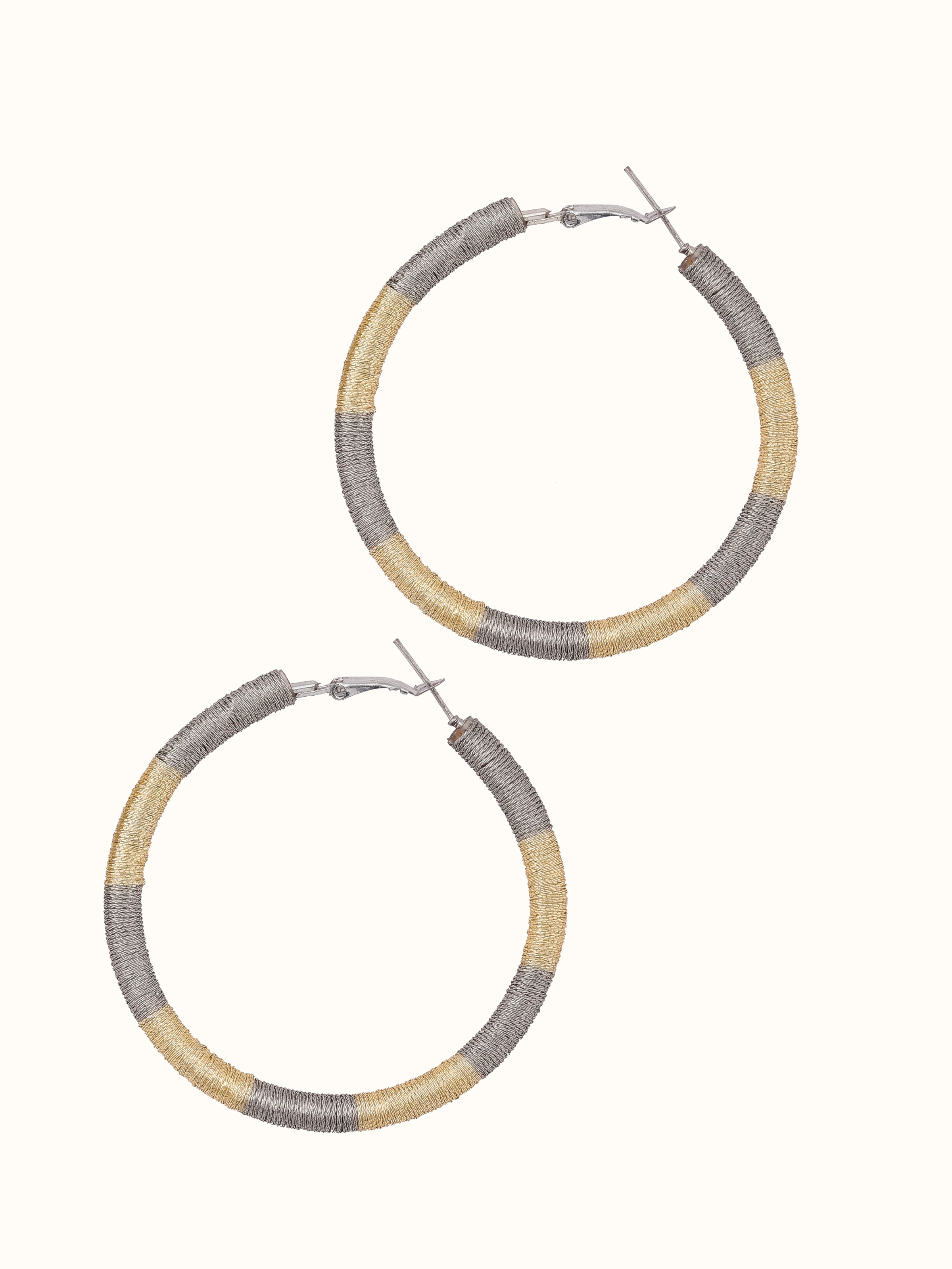 Worn view of handcrafted hoop earrings