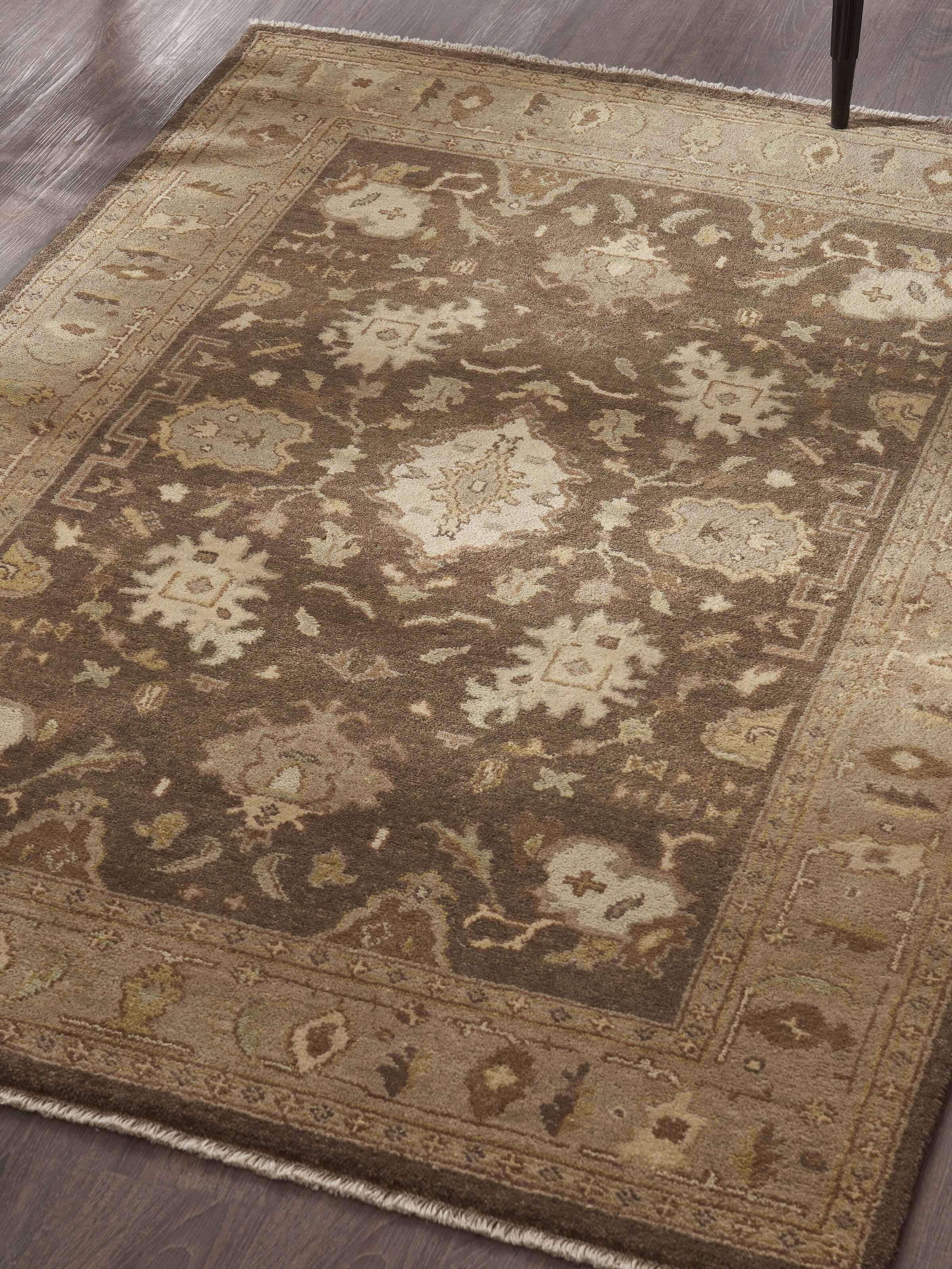 Lifestyle interior view highlighting brown Oushak-style Jaipur hand-knotted wool rug.