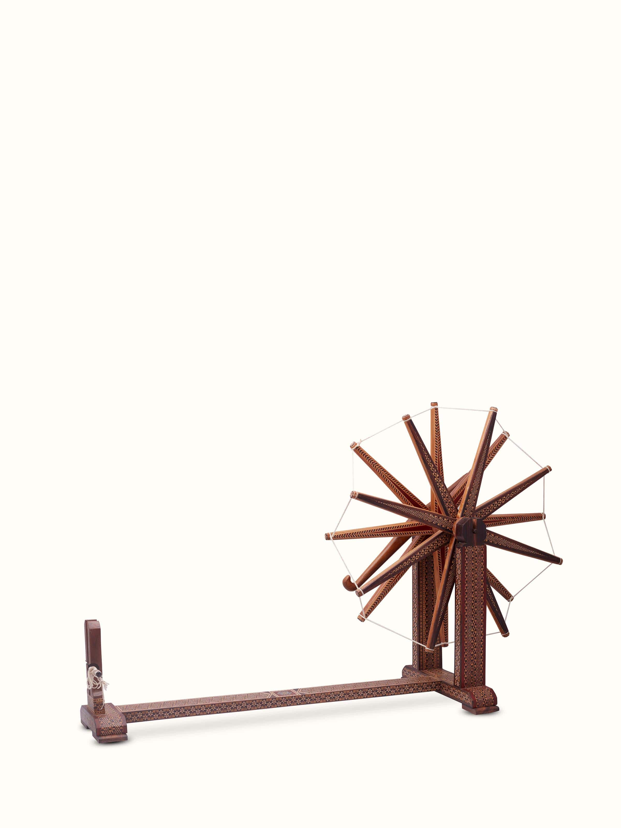 Close-up of Marquetry Rosewood Charkha in Multicolor
