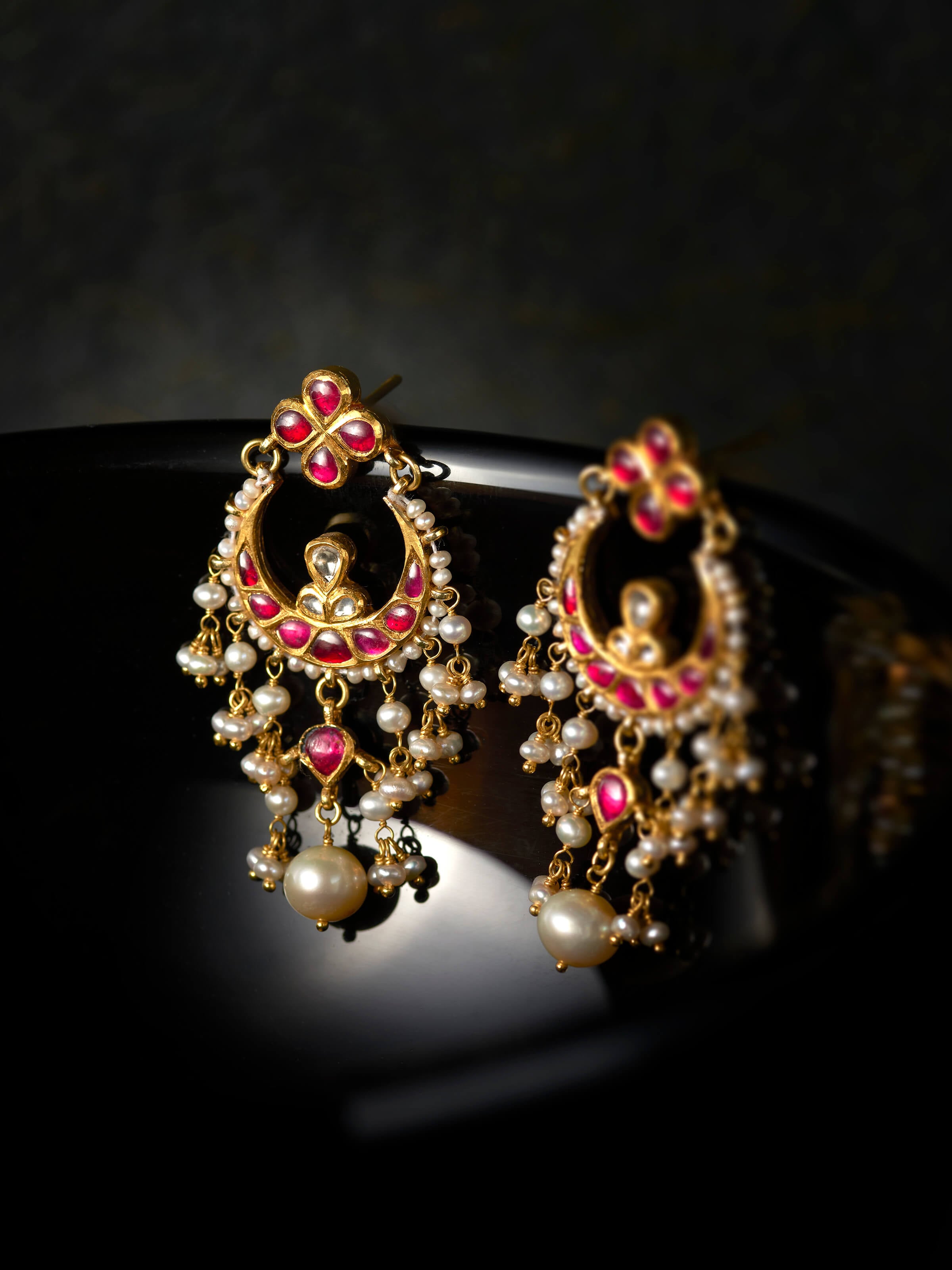 lifestyle view of jadau 18 karat gold drops