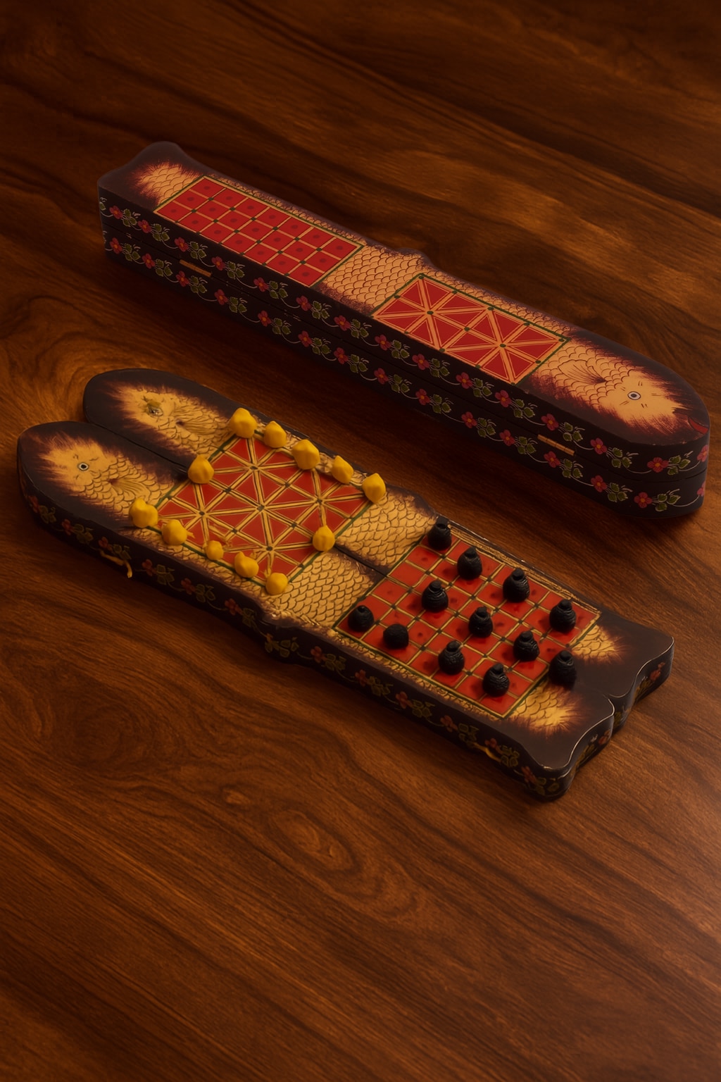 Lifestyle view of Ganjifa Cedar Wood 3-In-1 Mancala Board Game