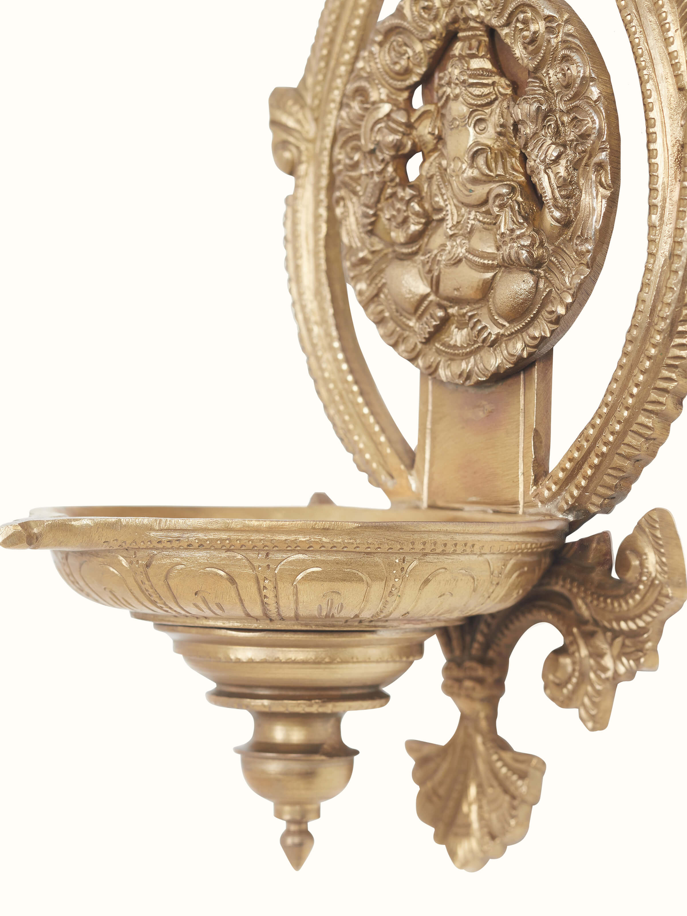 Polished casting hanging diya from a different angle, showcasing its ornate details and refined look.