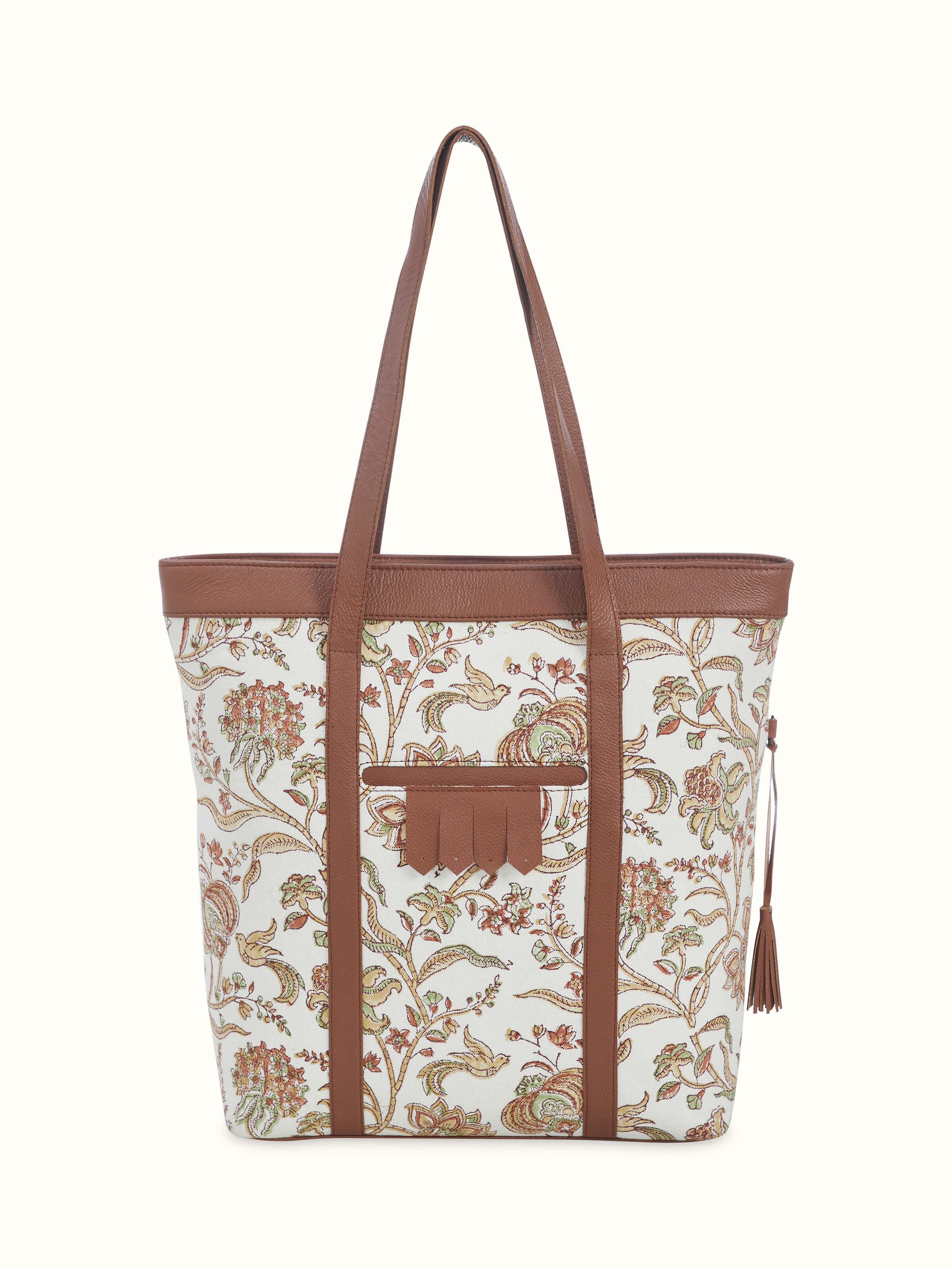 Front view of mustard leather and textile hand block printed tote bag with sturdy handles.