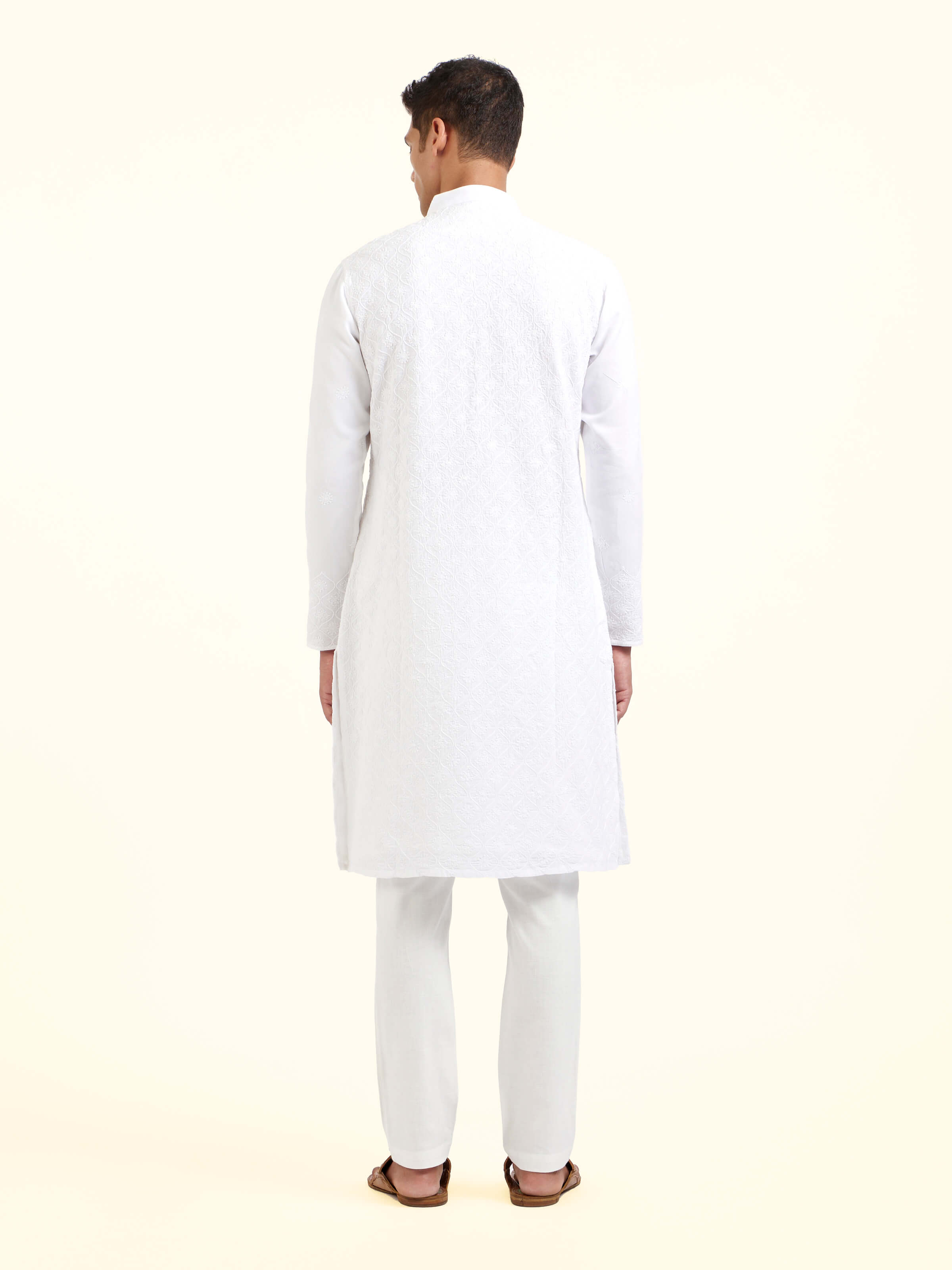 Back view of white cotton chikankari long kurta displaying clean finish