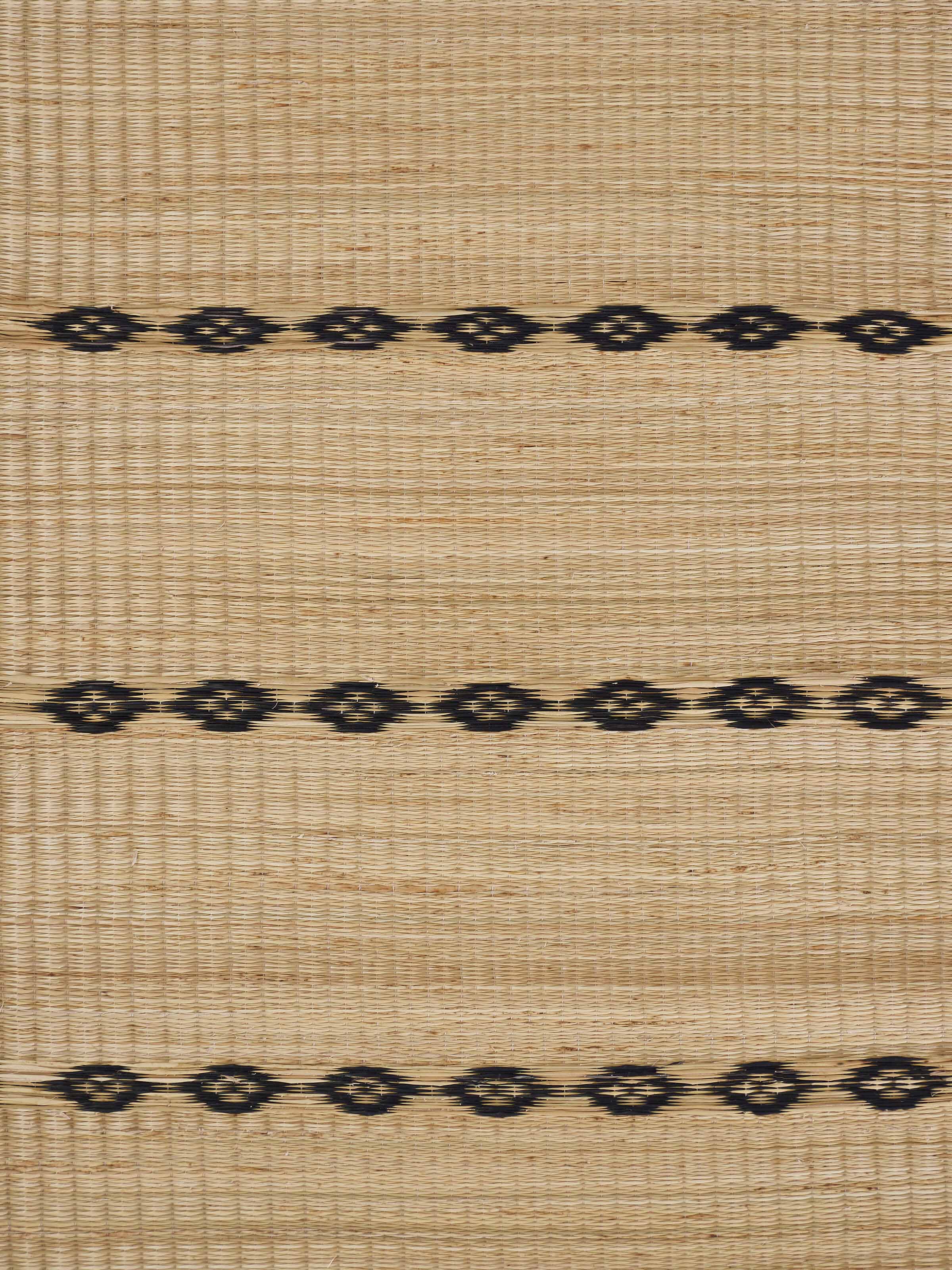 Close-up showing handwoven texture and stripe detail on Prakriti natural Madurkathi placemats