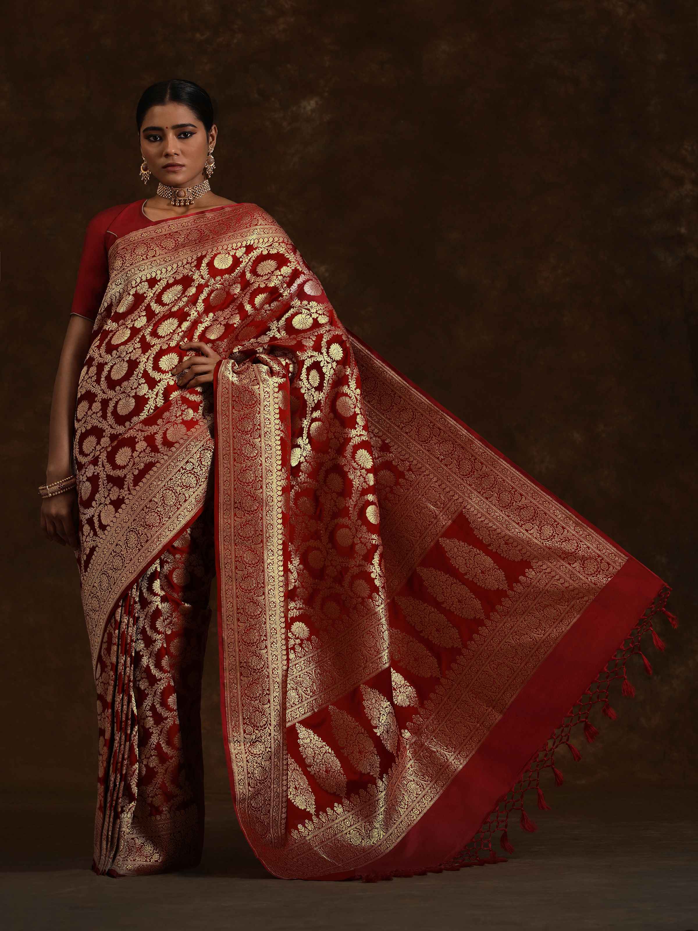 Lifestyle view of Ruby Wine Mulberry Satin Silk Banarasi Saree draped elegantly showing lustrous silk and zari