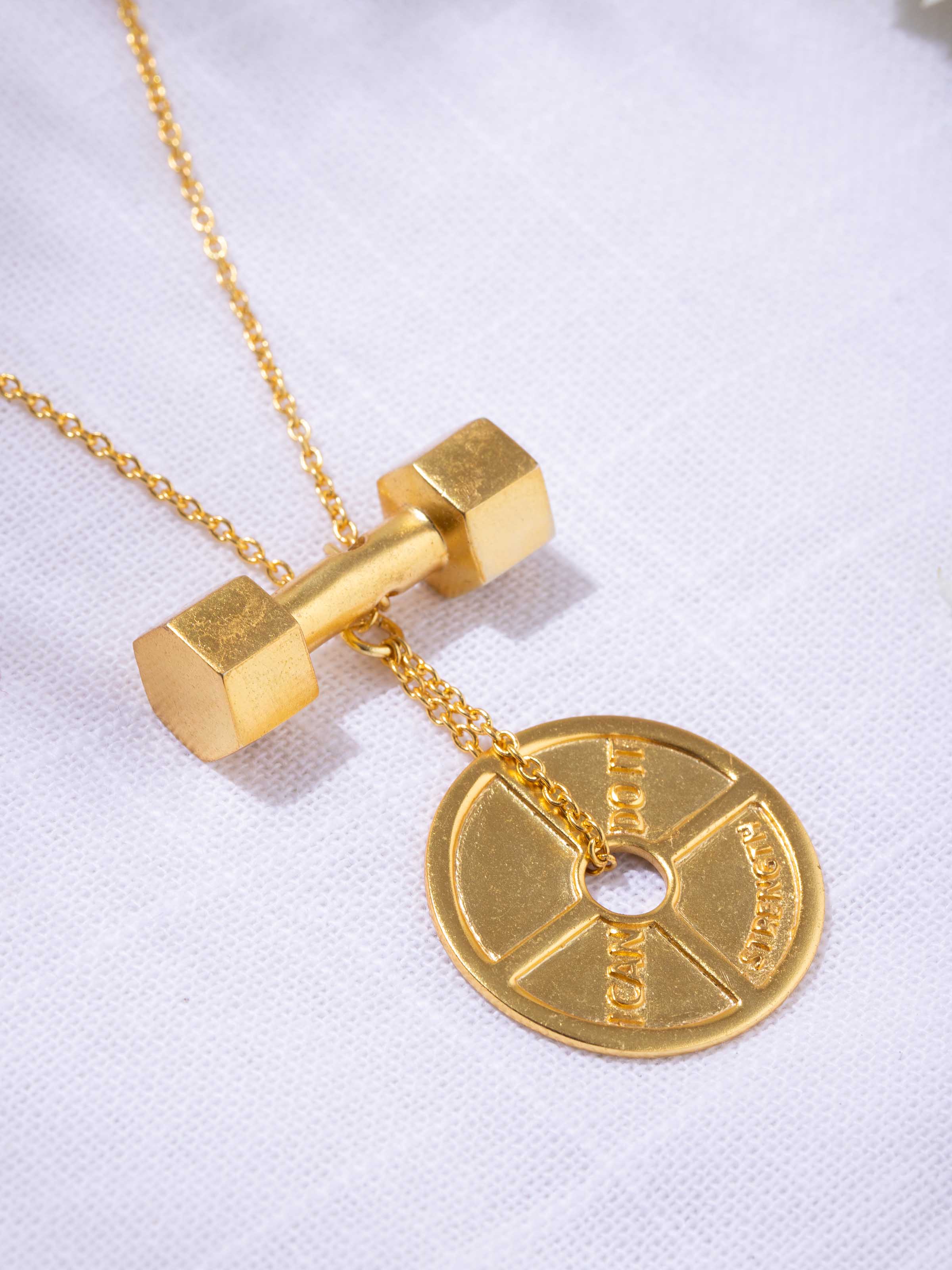 Detail shot showing etched patterns and sturdy chain link construction.