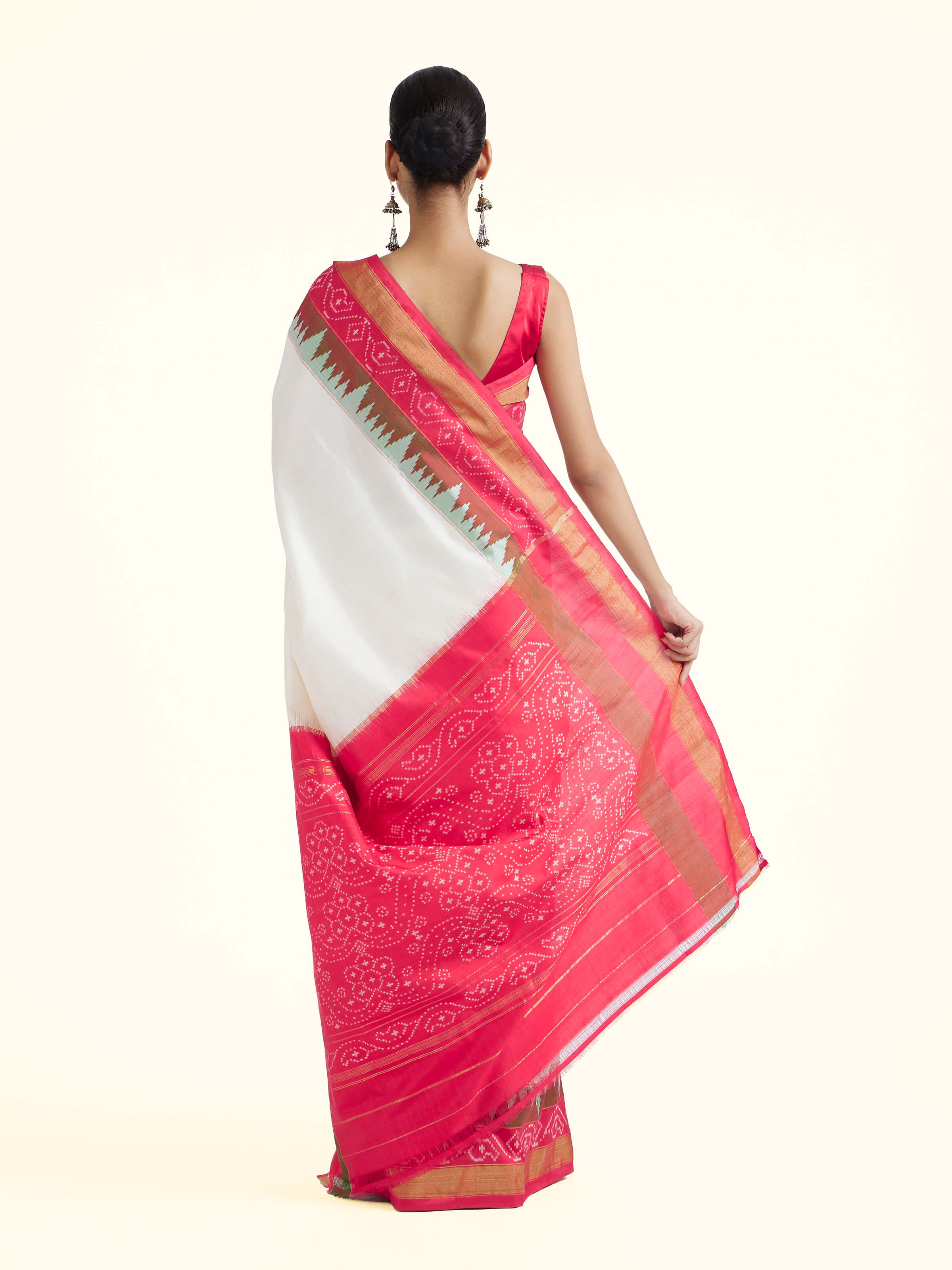 Back view of off-white mulberry silk ikat saree showing pallu design