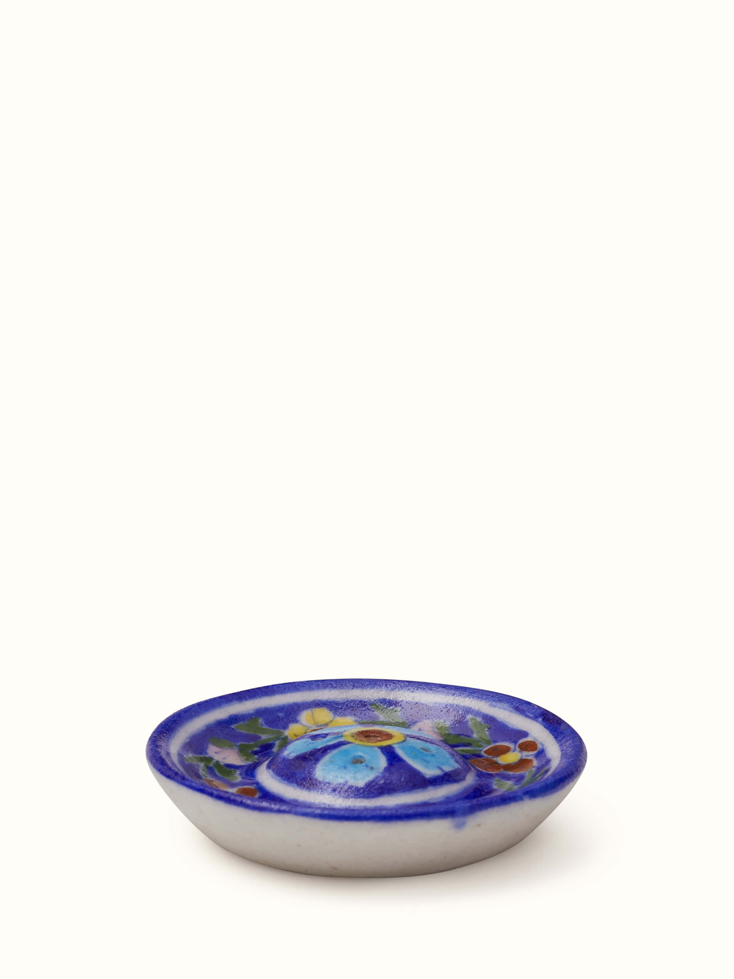 Front view of blue pottery ceramic floral incense stick holder for home decor