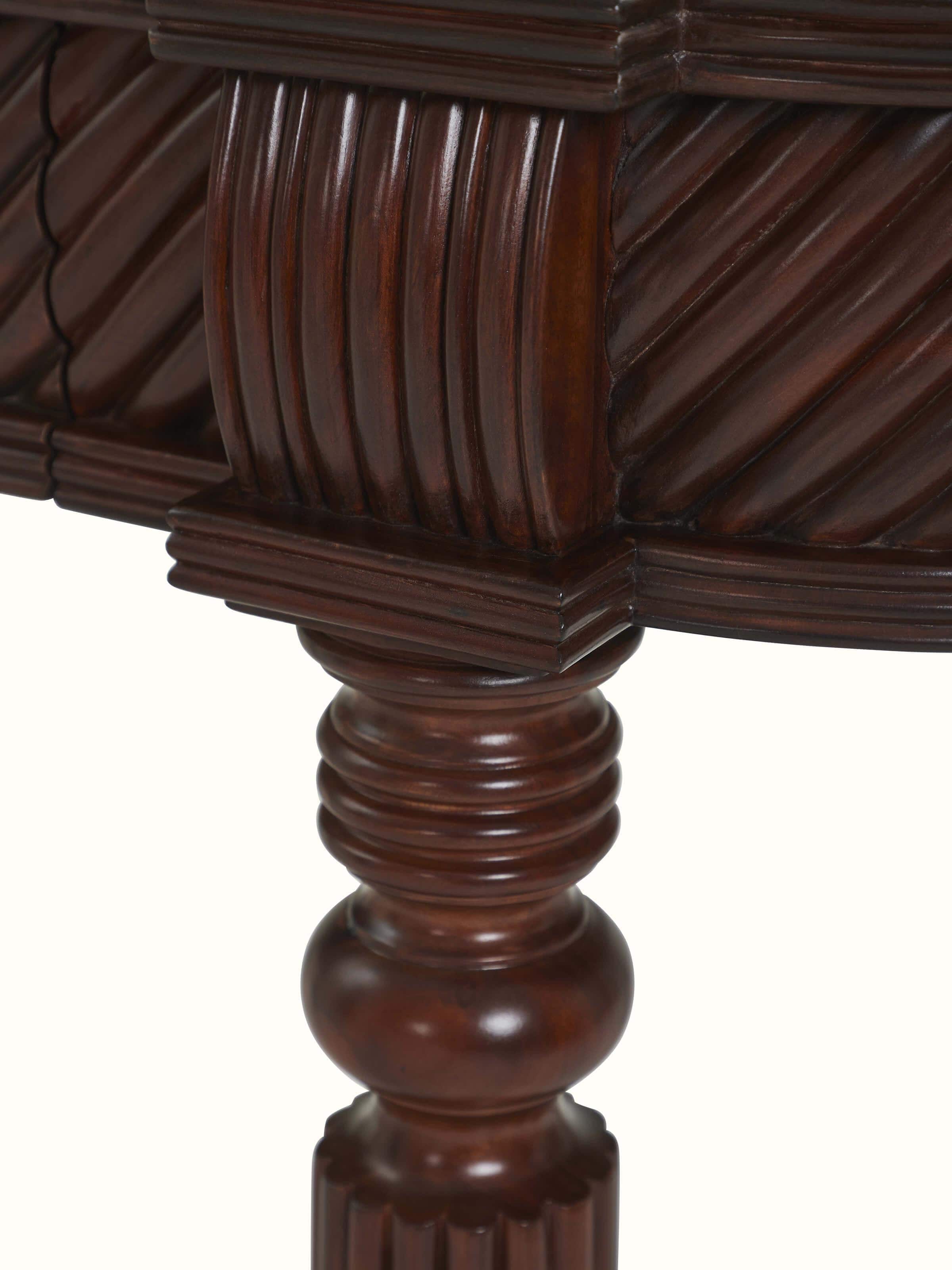 Detailed view of Mahogany Wood Console Table from Swadesh, focusing on its intricate design and natural wood texture for a sophisticated touch.