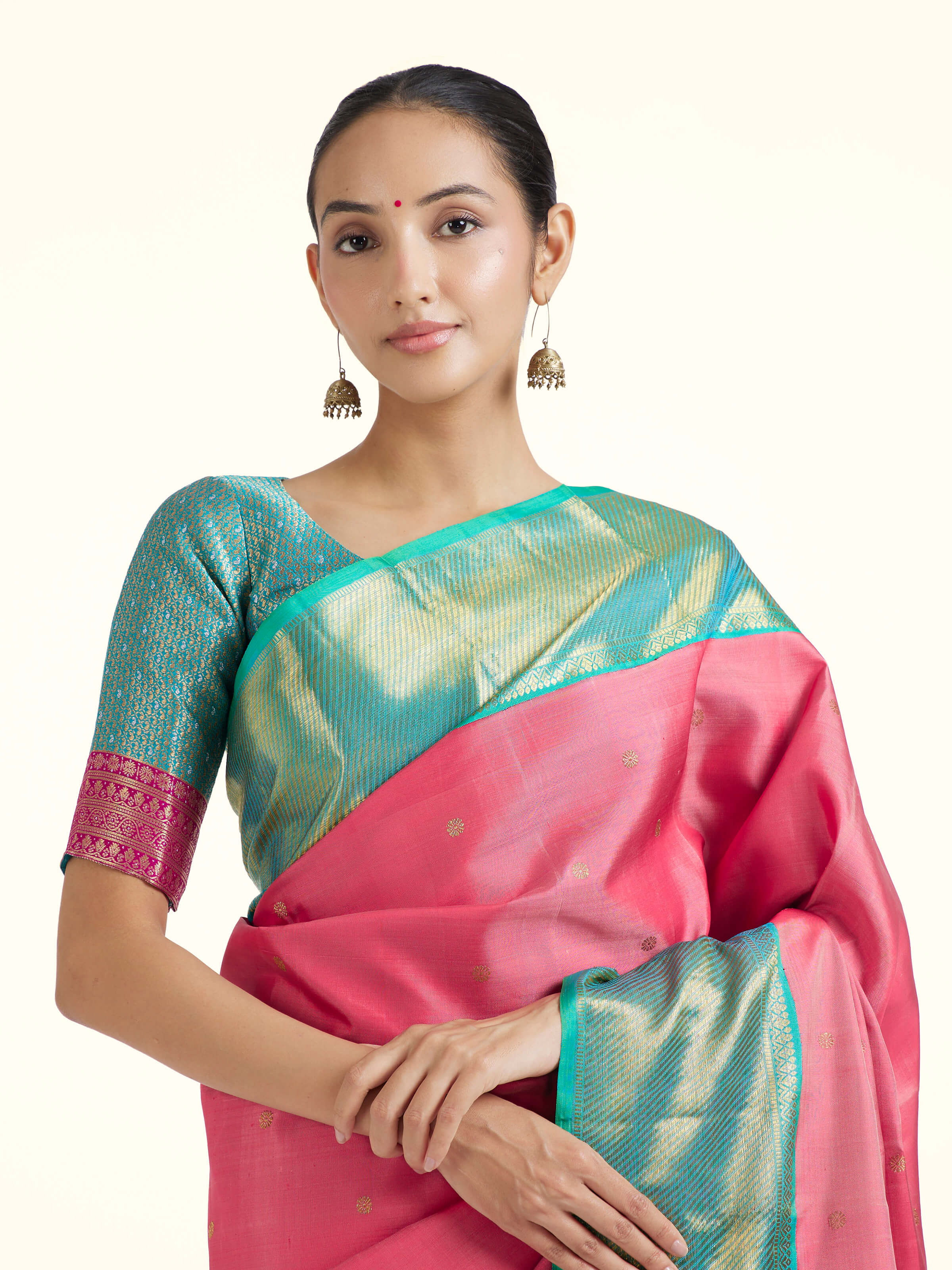 Angled view of wine silk Kancheepuram saree showcasing traditional weave and sheen