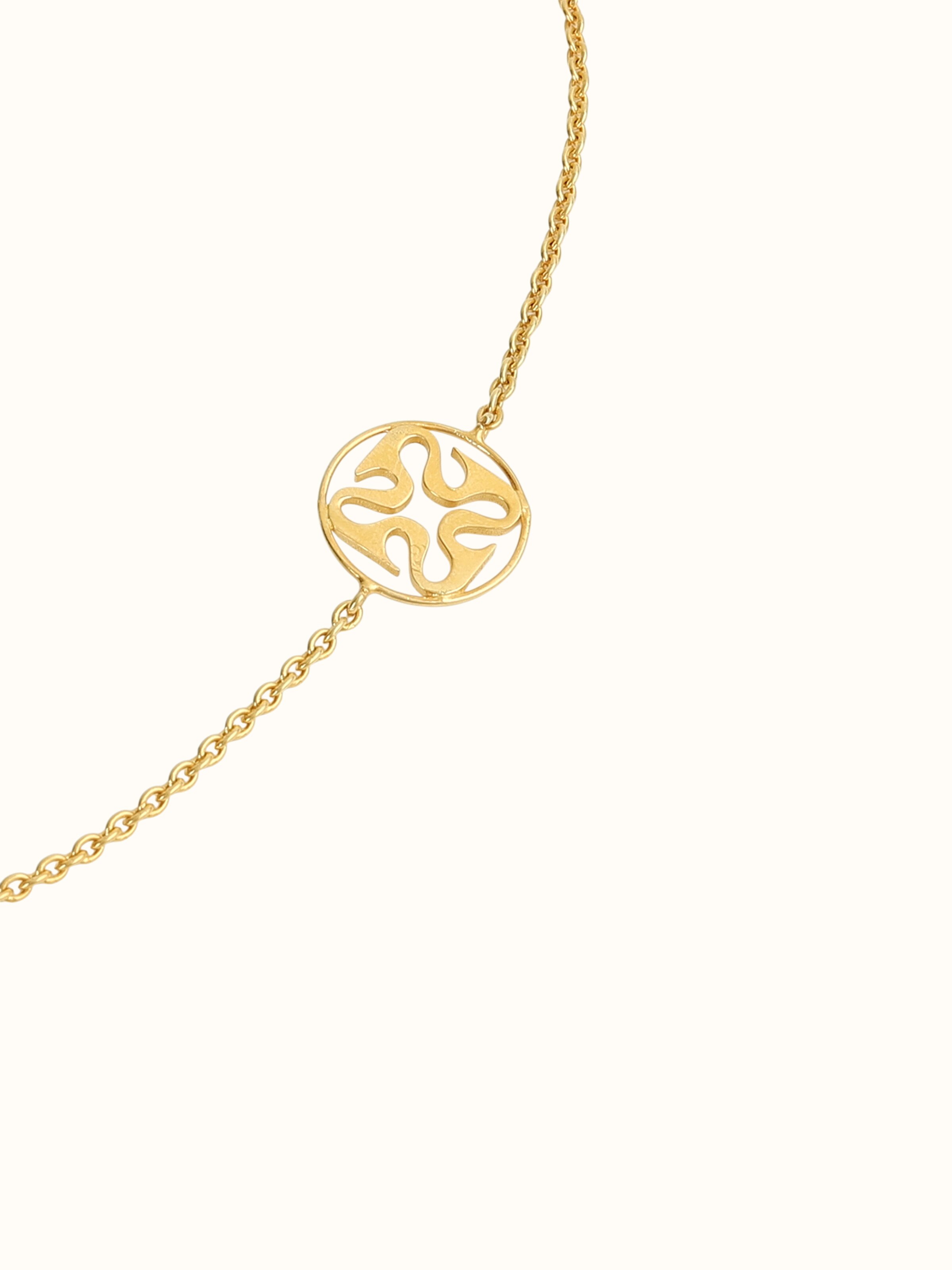 close-up view of thewa silver pendant and chain texture